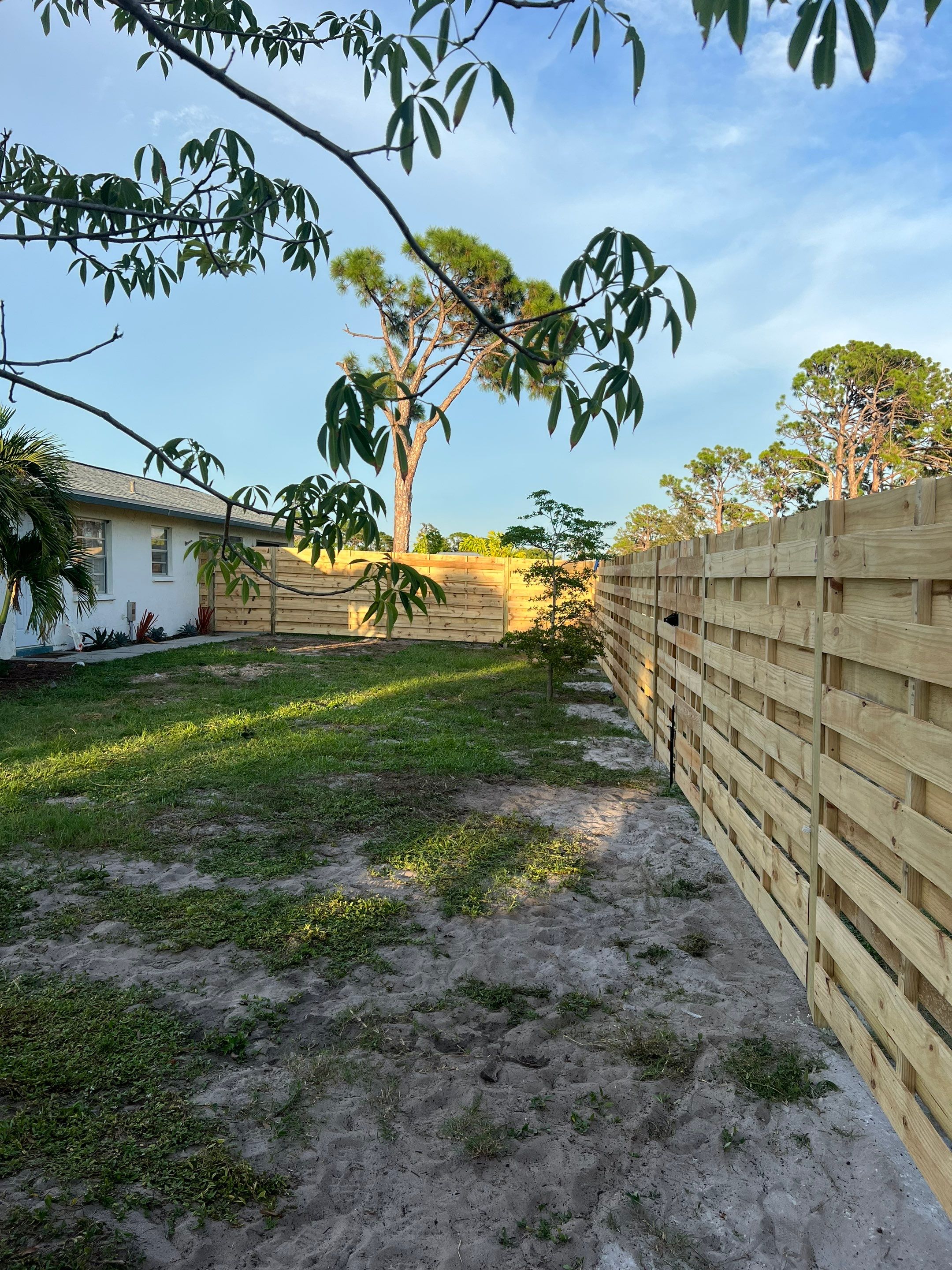 Wood Fence Installation using Horizontal Shadowbox Wood Privacy Fence by Asap fence and gates, LLC