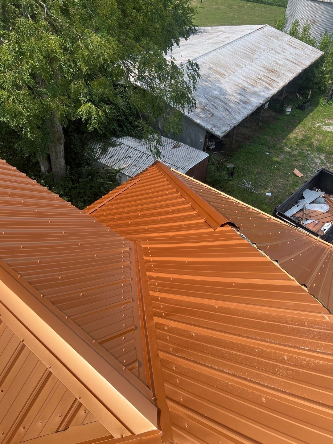 Residential Roofing Installation using Performance Panel Metal - Copper Metallic by RoofX 