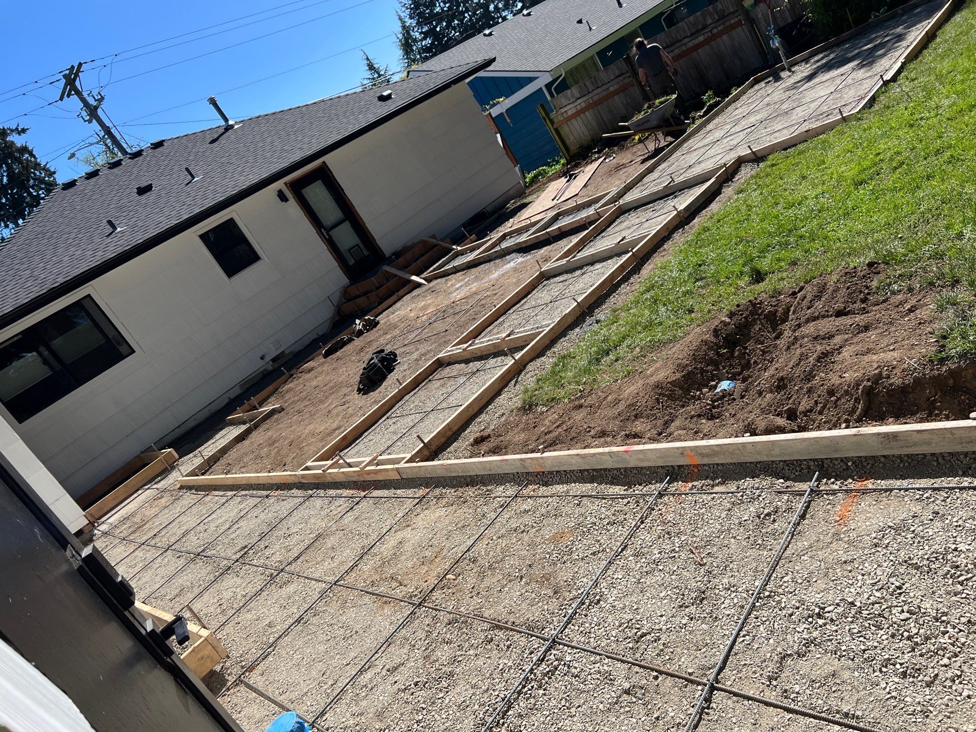 John | Concrete Backyard Walkway by Jireh Asphalt & Concrete Inc 