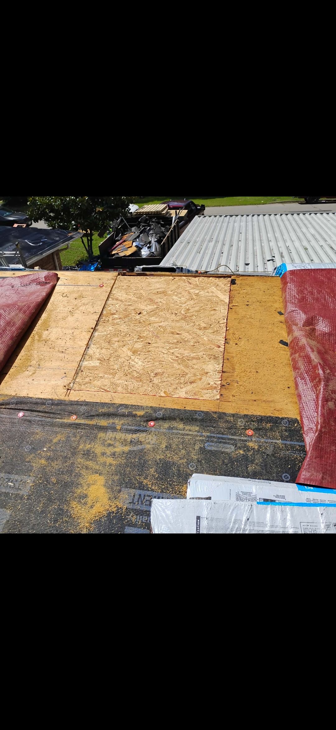 Reroof with Panels by Berry Good Roofing