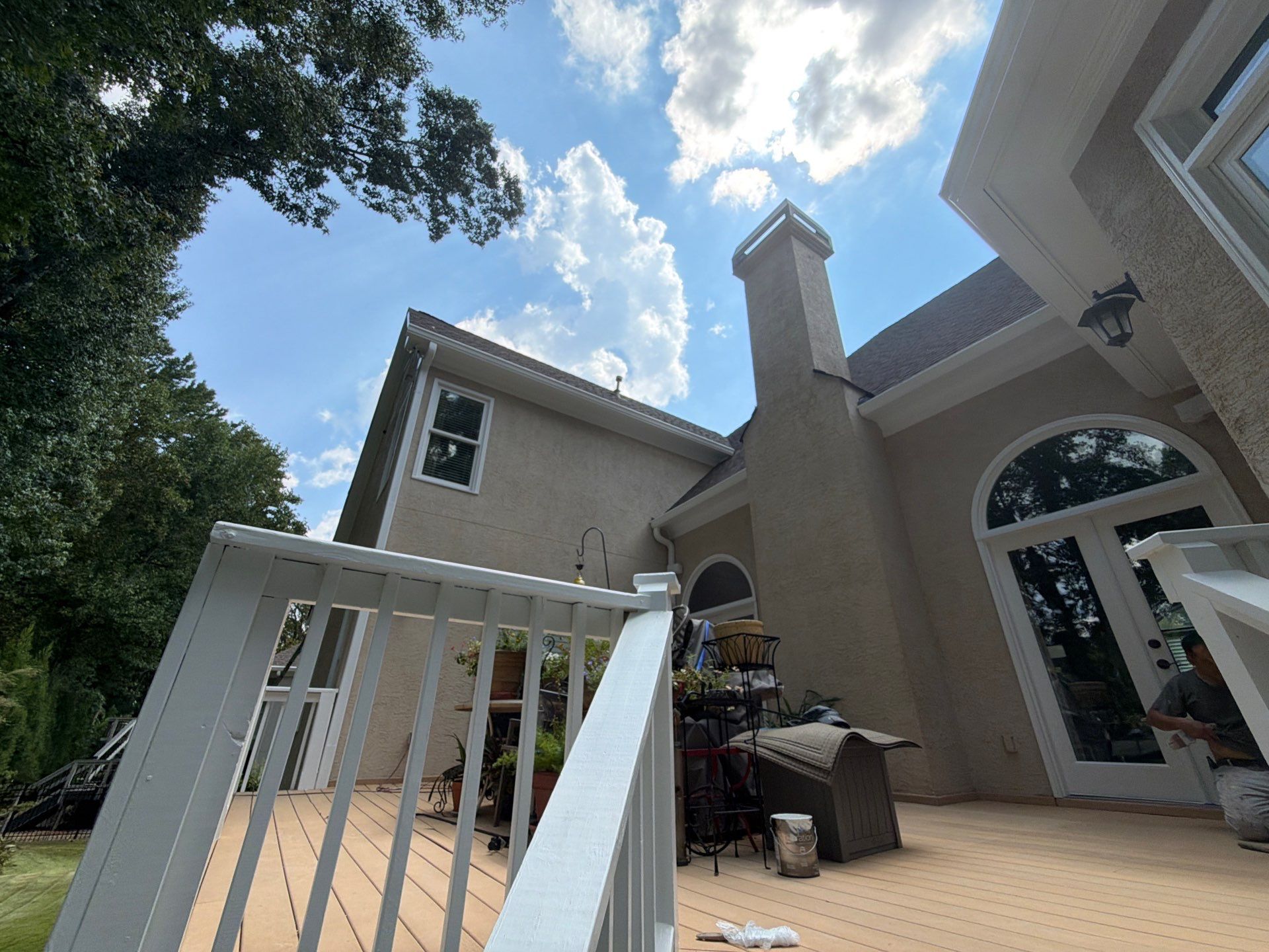 Multi-Story Stucco Home Exterior Painting and Garage Refresh in Marietta by Swift Home Renovations 