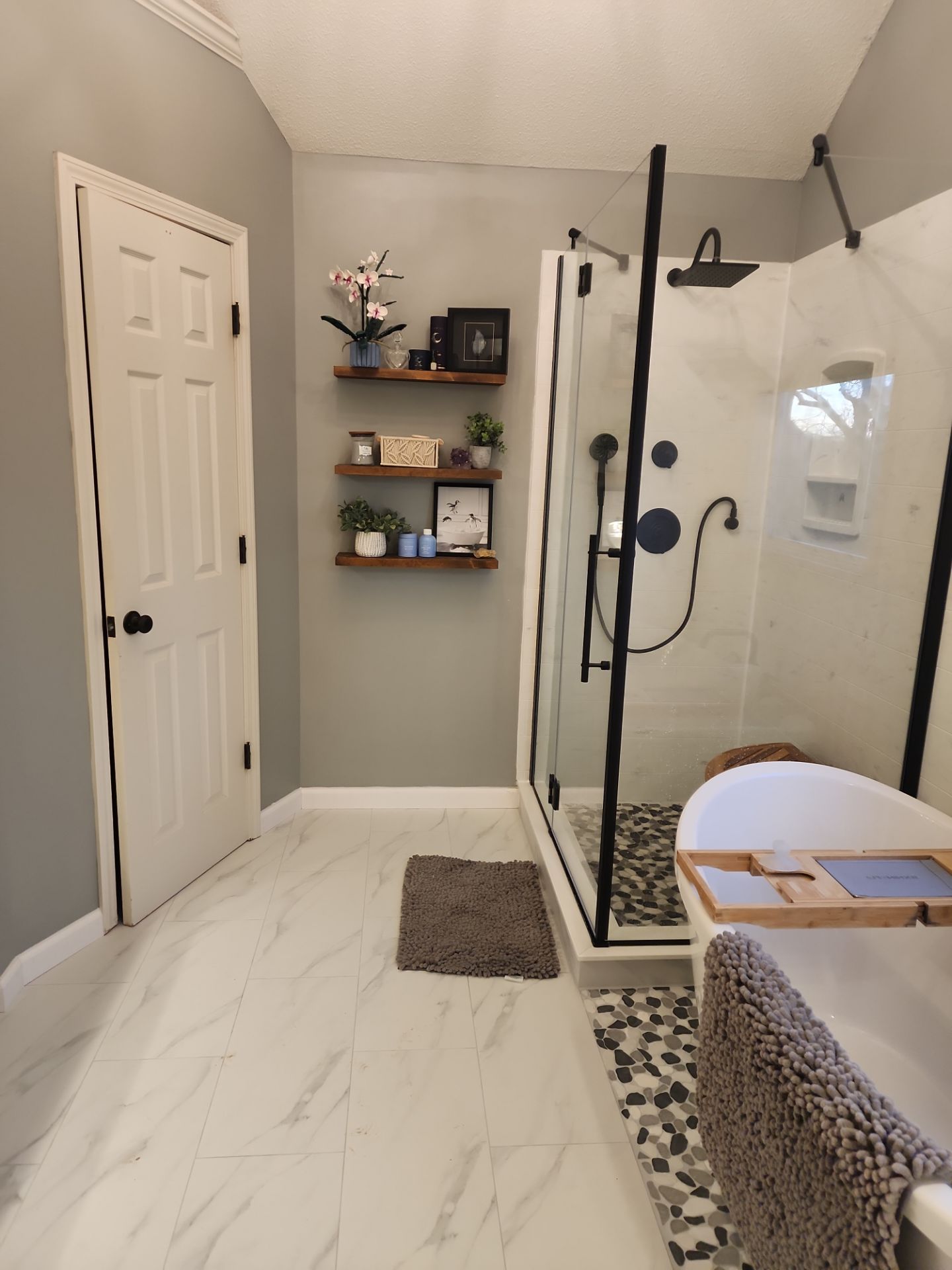 Beautiful use of many materials by The Shower Company
