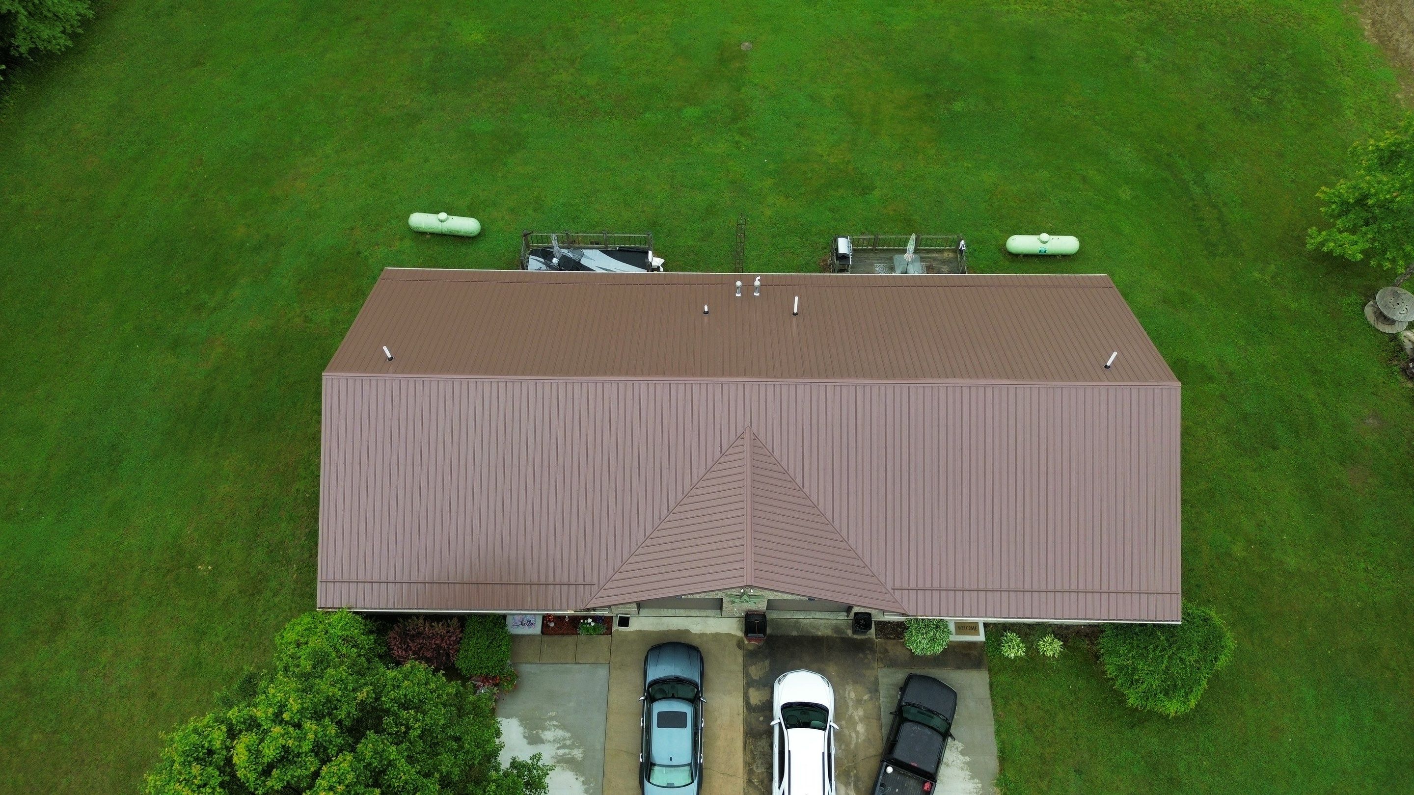 Residential Roofing Installation using Performance Panel Metal - Coca Brown by RoofX 