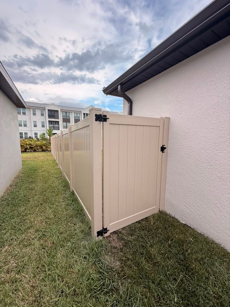 Tan Vinyl Privacy Fence Installation for Sarasota Home by True Fence LLC