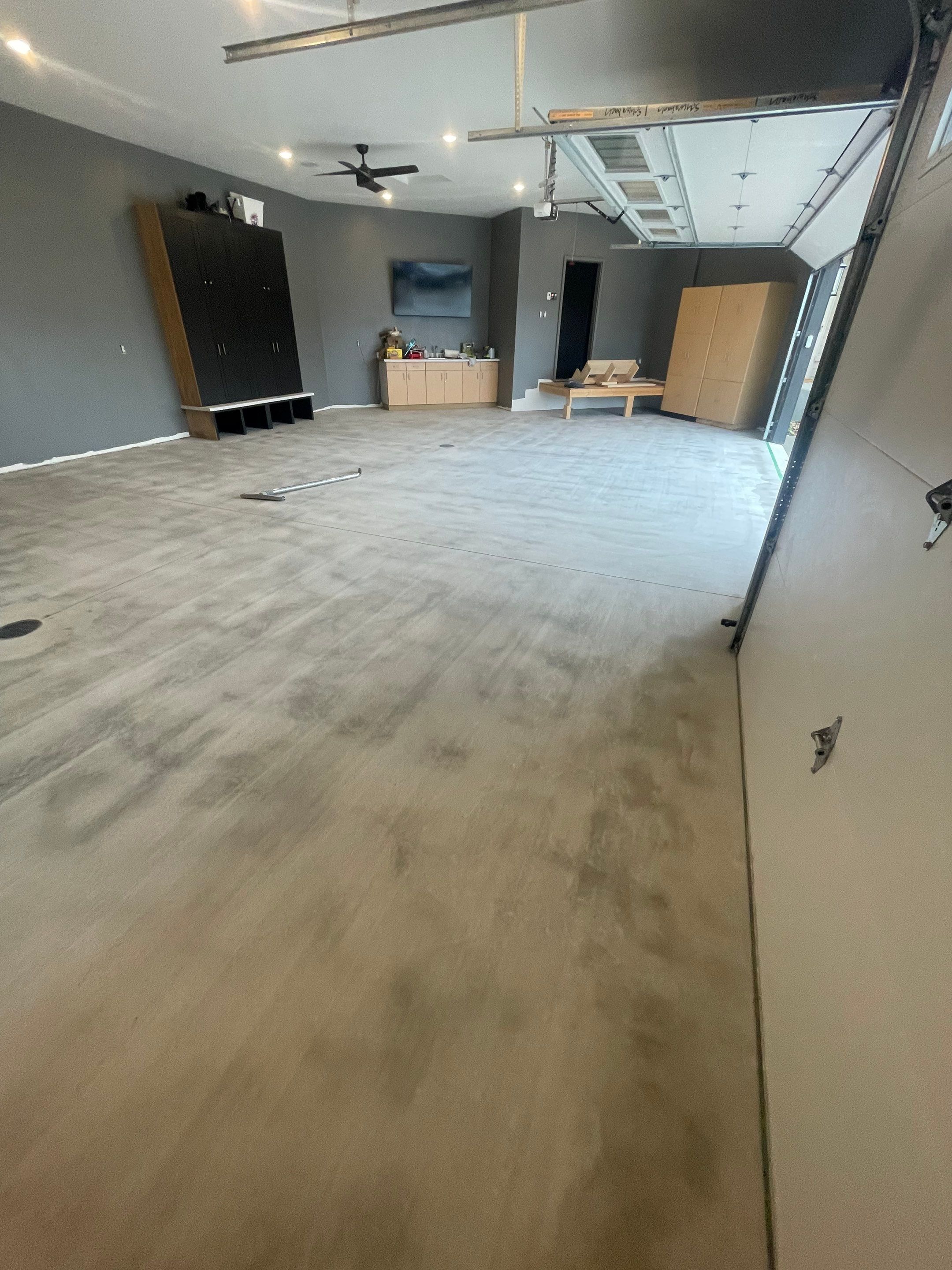 Custom Speckled Concrete Coating for Dell Rapids Garage by Select Painting, Coatings & Garage Cabinets