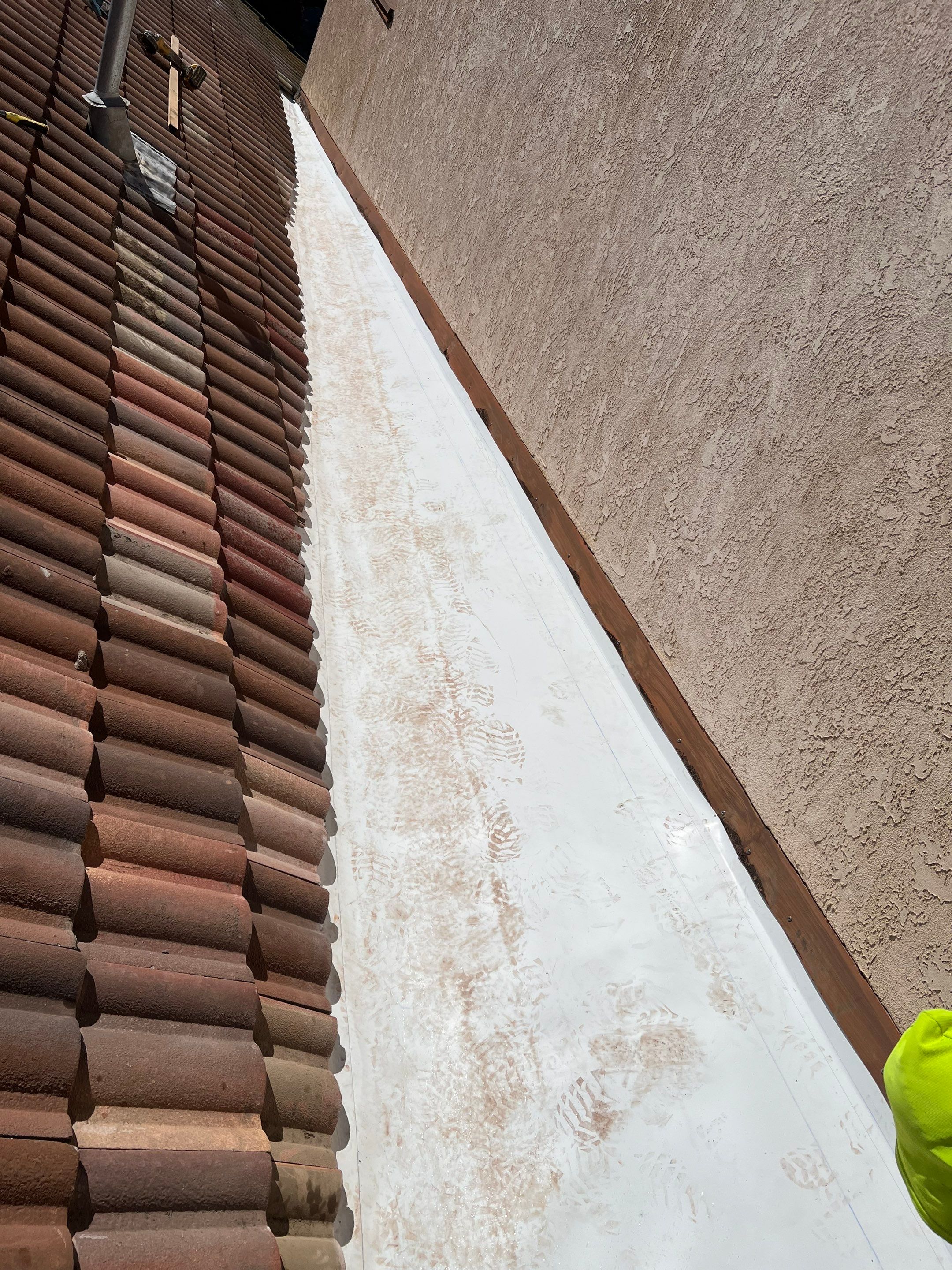 Tile Roof repair by Grandmark Service Company