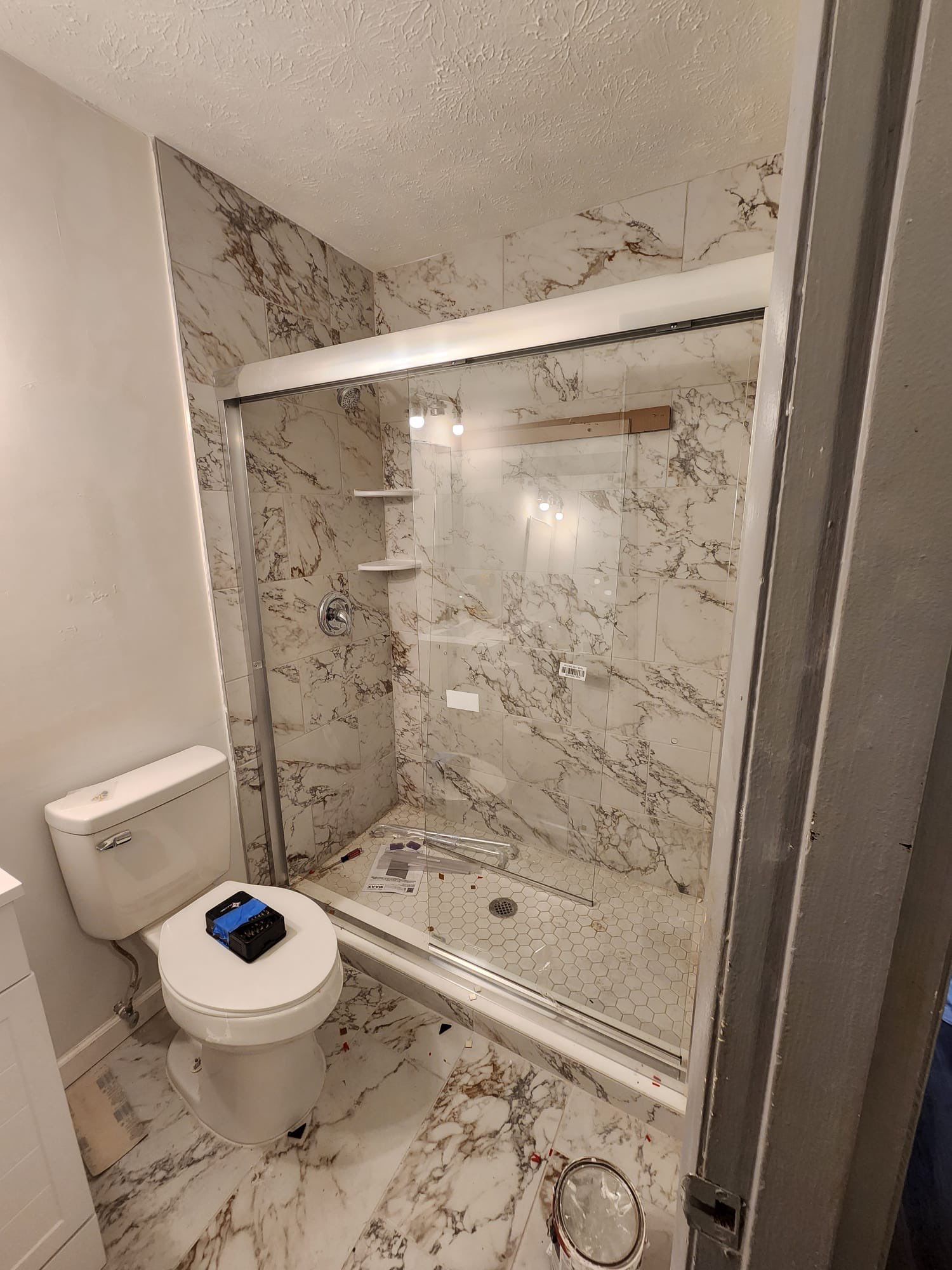 Dual Bathroom Makeover by urban green energy llc