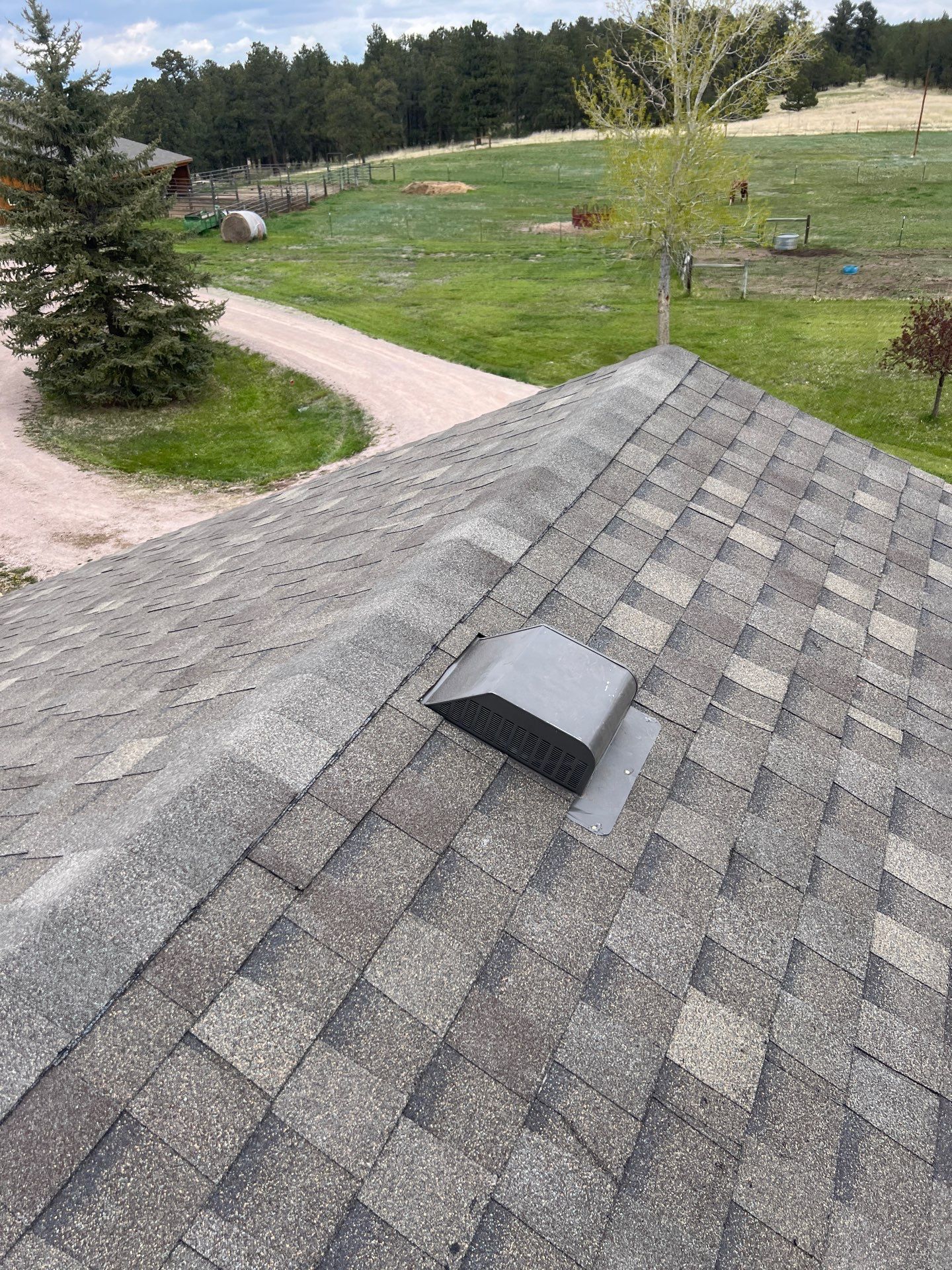 Residential Roofing Installation using Atlas Pinnacle Impact Weathered Wood by Blue Peaks Roofing LLC 