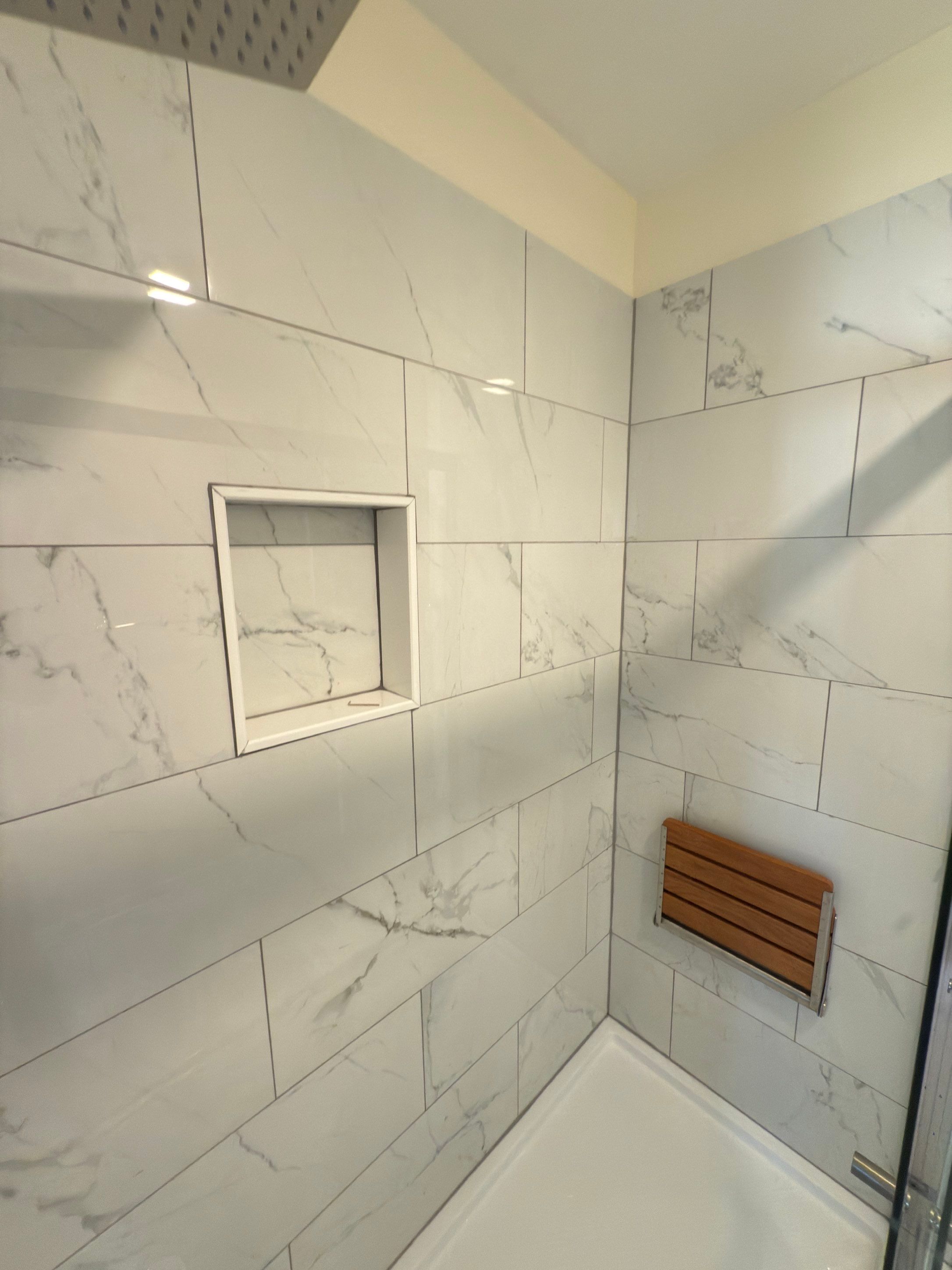 Bathroom Remodel using Tile by Home Concepts Construction
