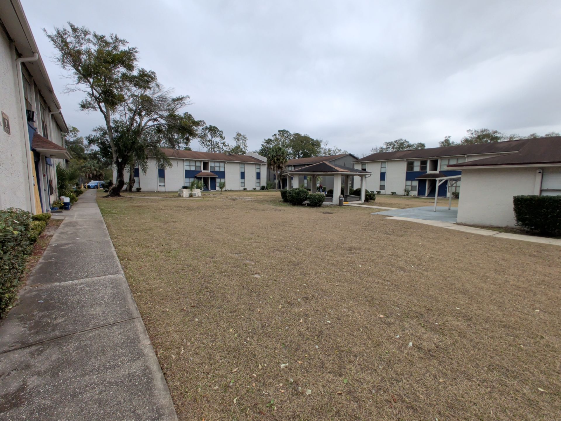 Commercial Landscape Cleanup & Weekly Maintenance — Grassy Pond Apartments by Harmoni Home Services