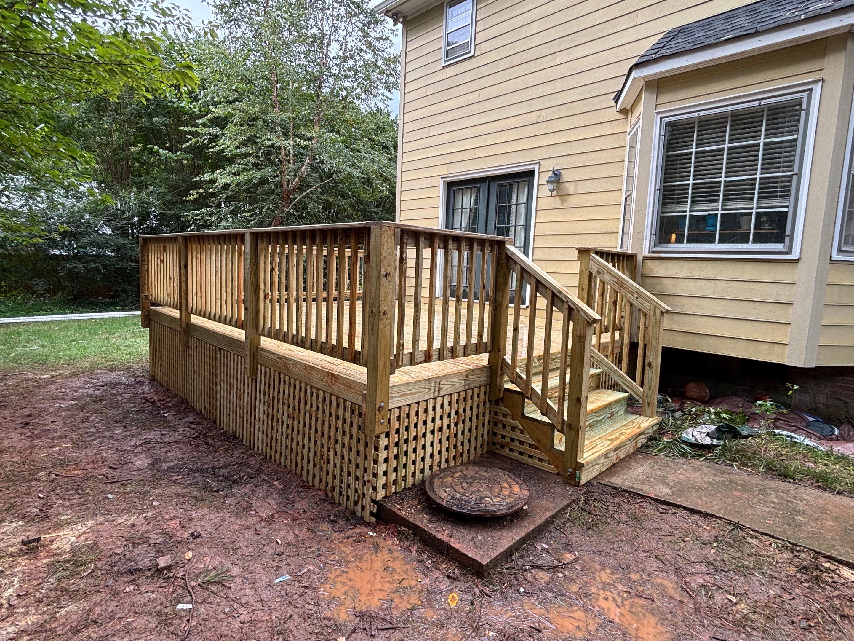James Hardie Siding Replacement and Custom Deck Construction in Cary by The Remodeling Company