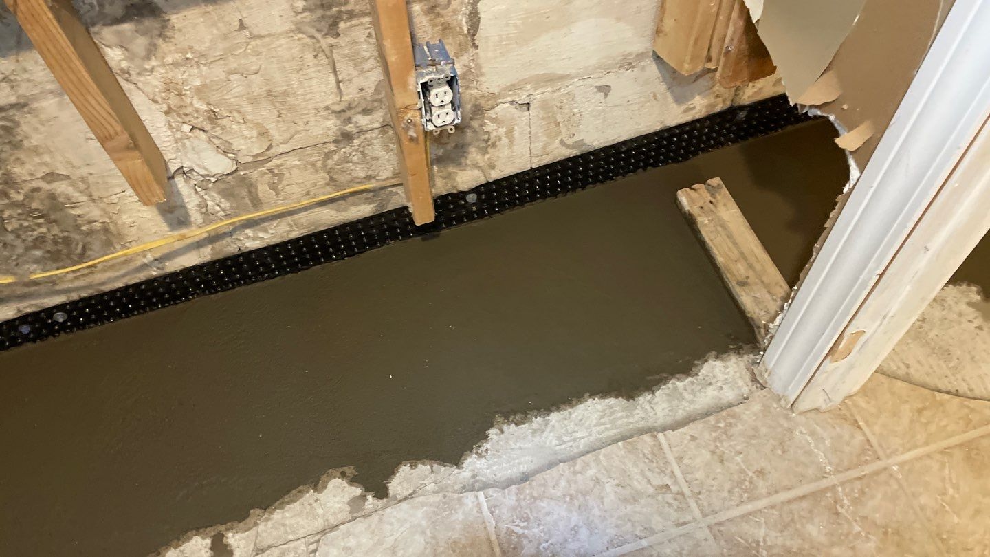Drain Tile in Minneapolis for Kristen & Taylor by Waterproofing Northeast