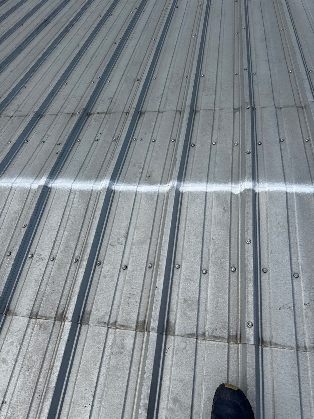 Metal Roof Fastener Replacement and Seam Sealing in West Point, NE by Crows Roofing LLC