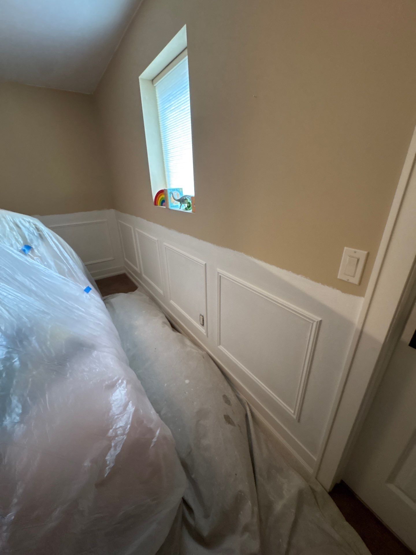 Sioux Falls Interior Painting with Custom Wainscoting and Decorative Wallpaper by Select Painting, Coatings & Garage Cabinets