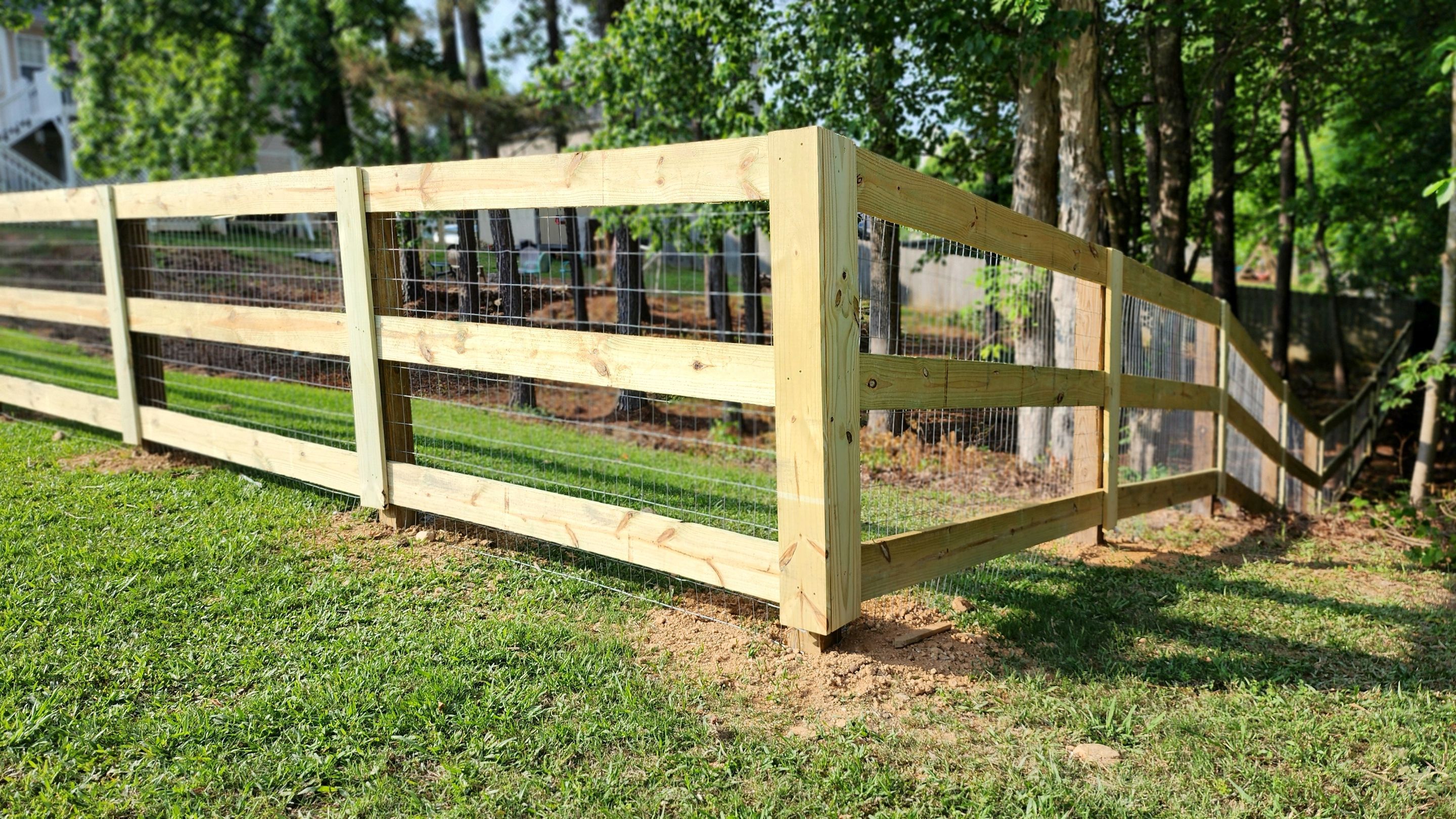Fence Installation of 3 Rail Ranch with Wire Backing by Titans of Timber Fence & Stain