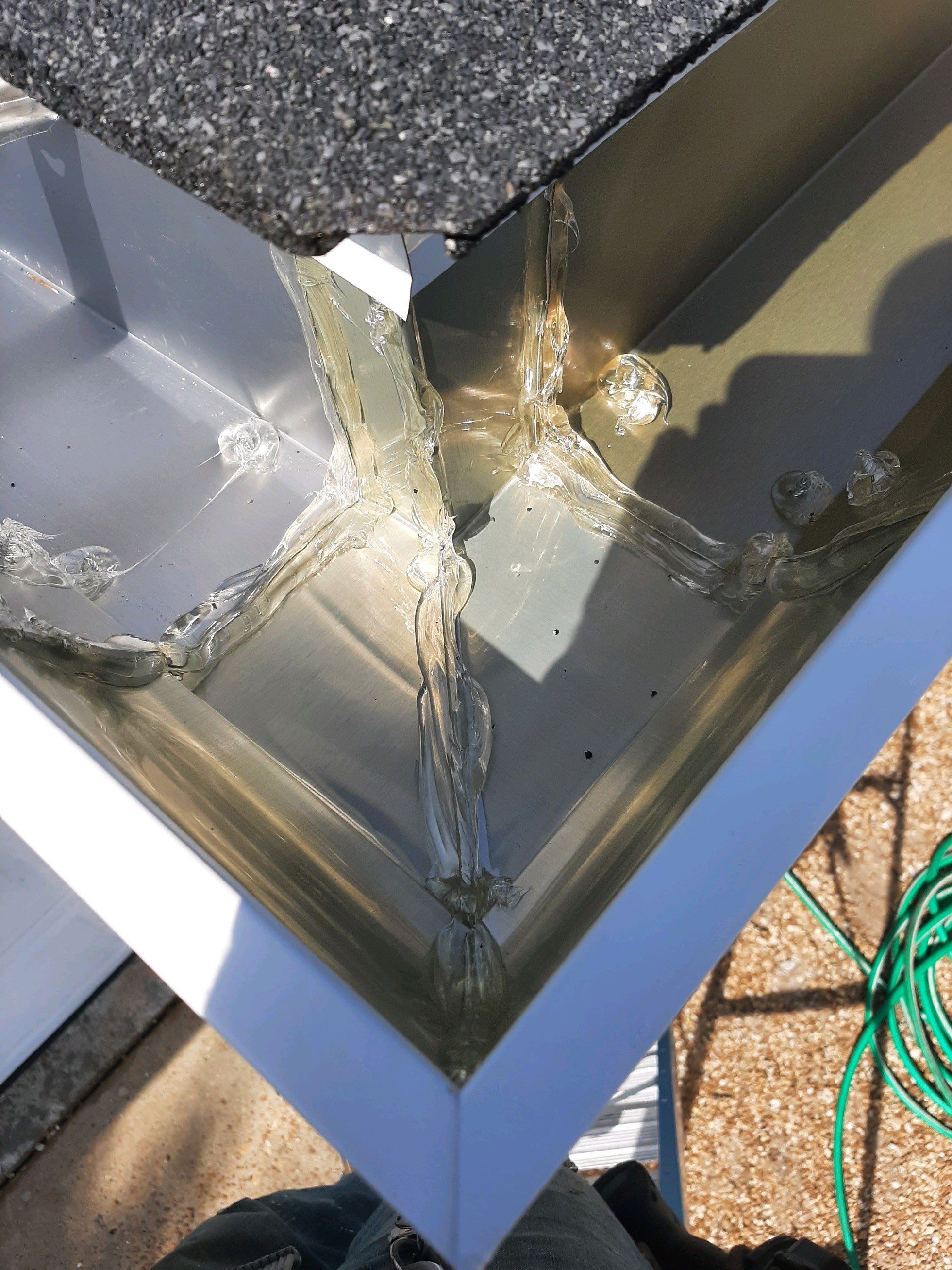 Seamless Gutter Installation using White K-Style Gutters by Gutter Professors