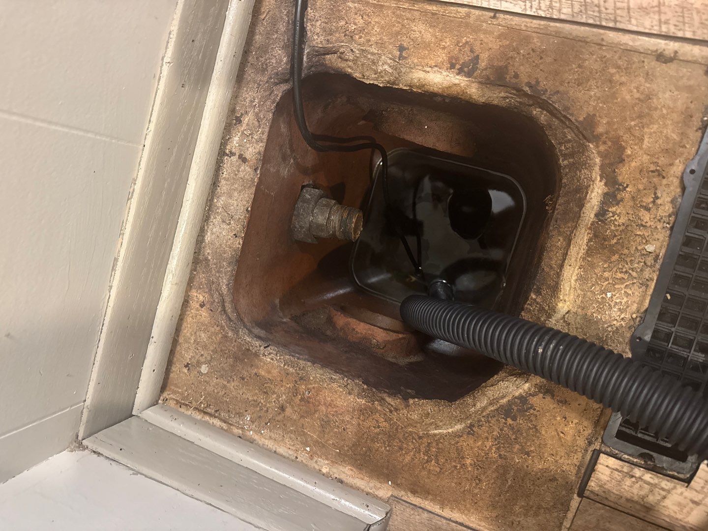 Richard’s Sump Pump Discharge Line Fix by Waterproofing Northeast