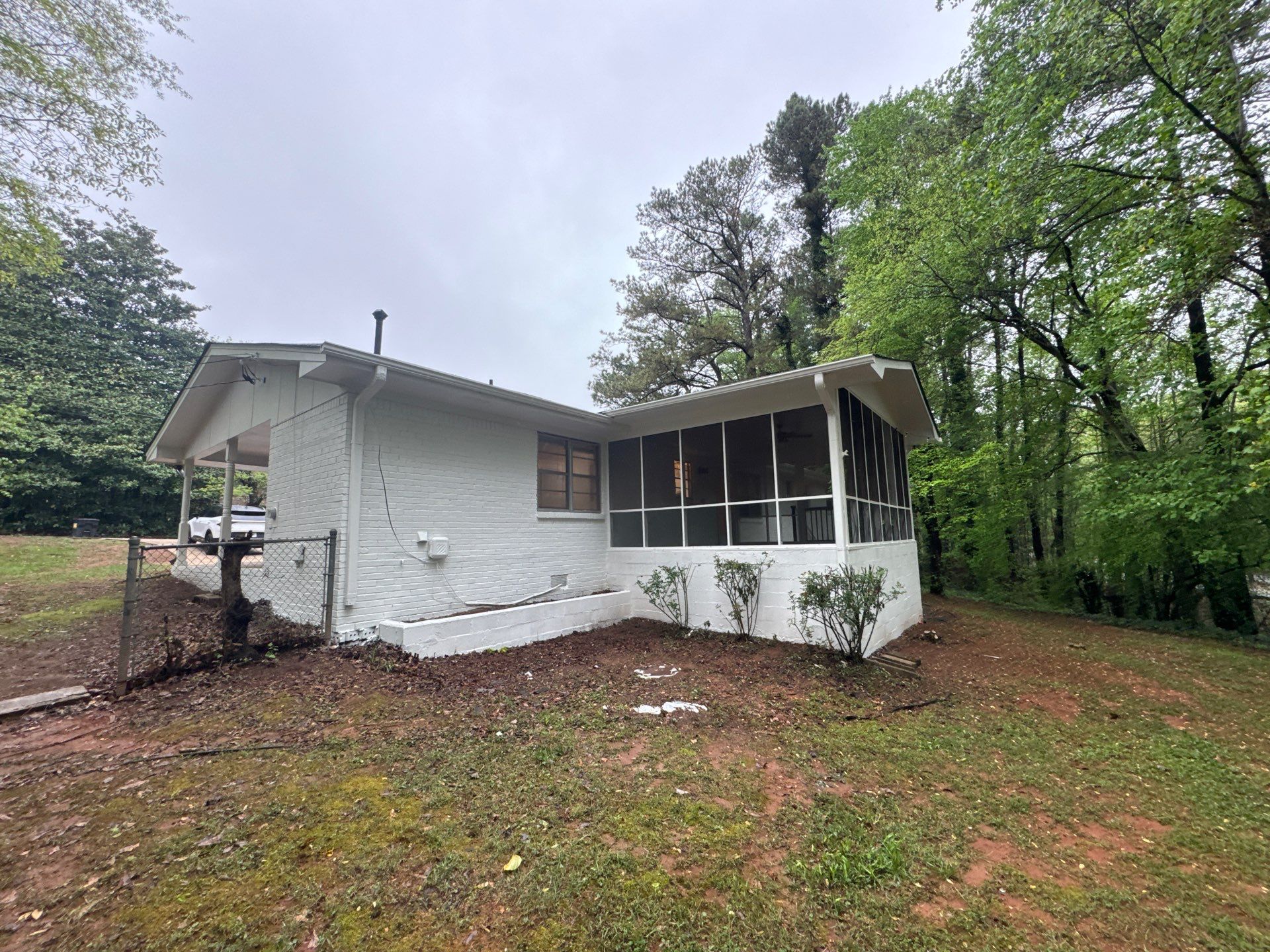 White Brick Exterior Painting and Shutter Refresh in Marietta by Swift Home Renovations