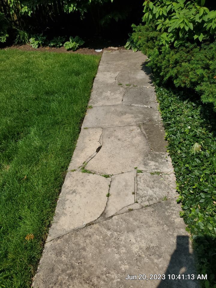 natural stone cleaning using Algaecide, soft wash soap by Northern Power Washing LLC.
