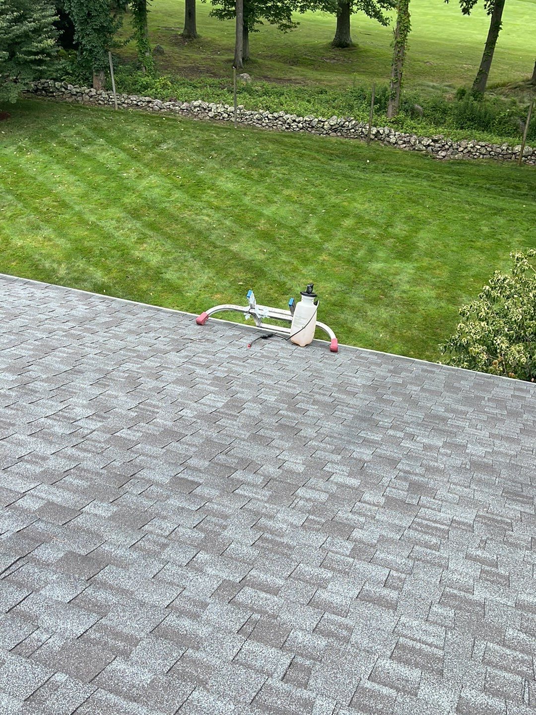 Gutter Installation using White gutters and roof clean up by A Plus Exterior