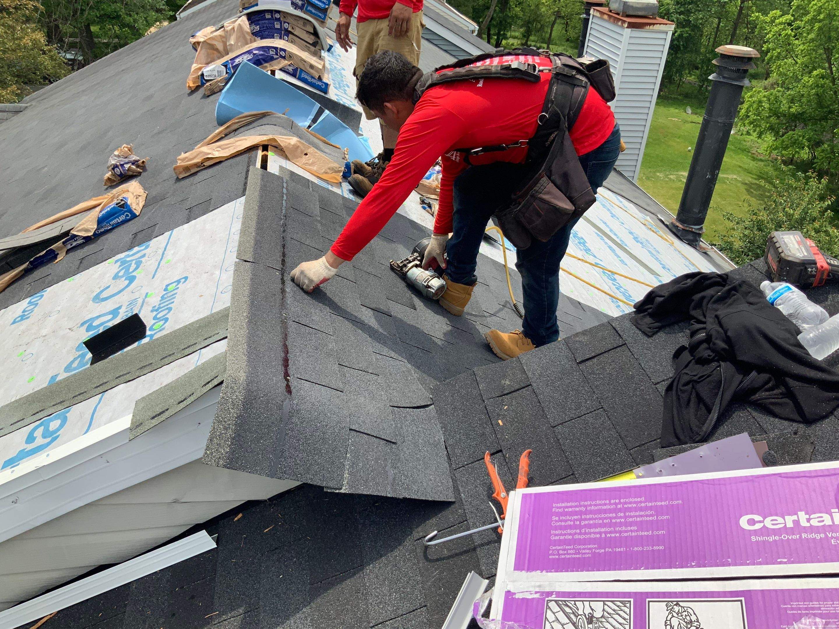 Residential Roofing Installation using XT-25 Color Moire Black by Alpha Design Services