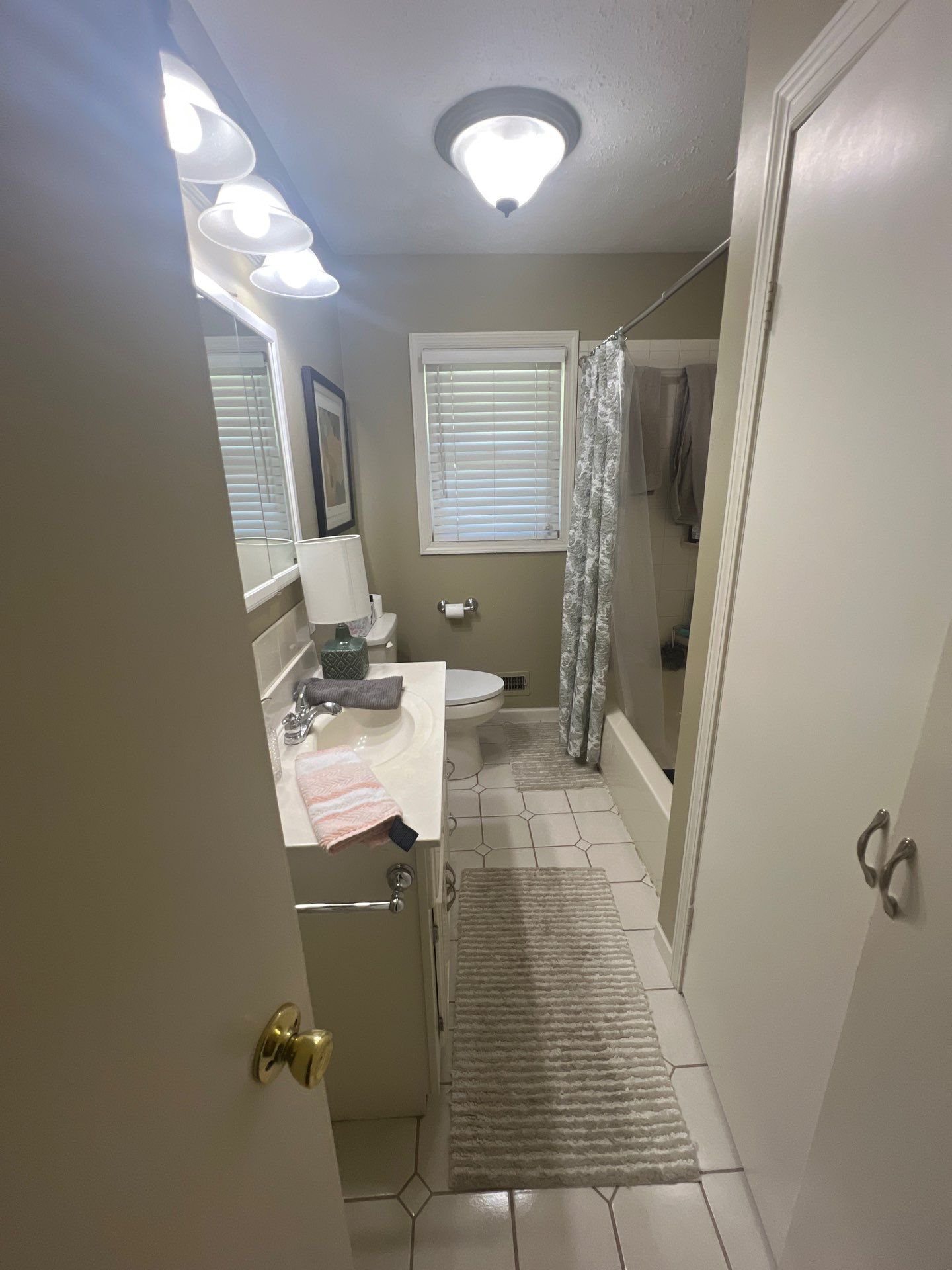 Full bathroom with custom tile by The Shower Company