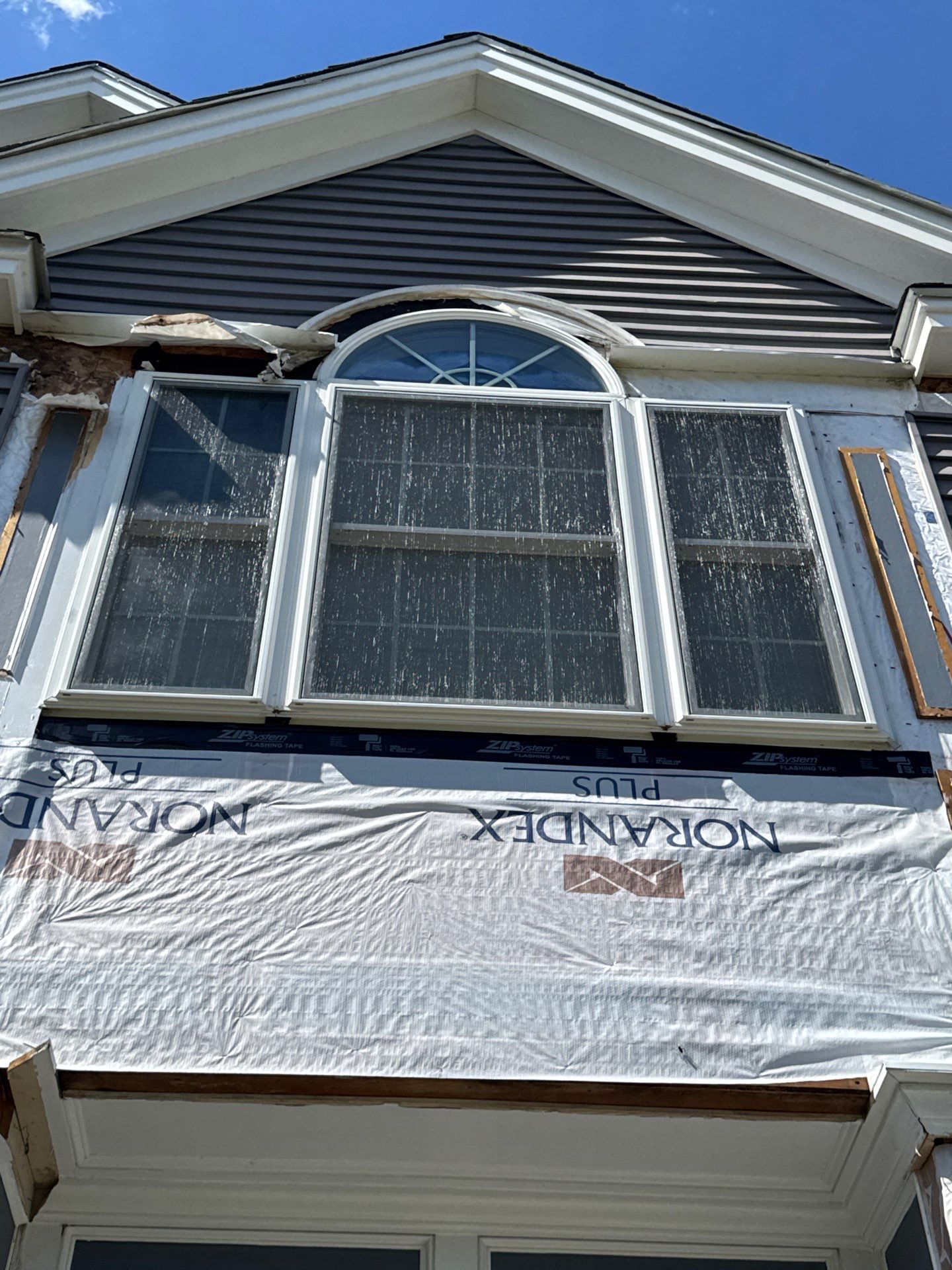 Roof, Trim, Deck, and Gutter Restoration by Mighty Dog Roofing of Greater Middlesex County