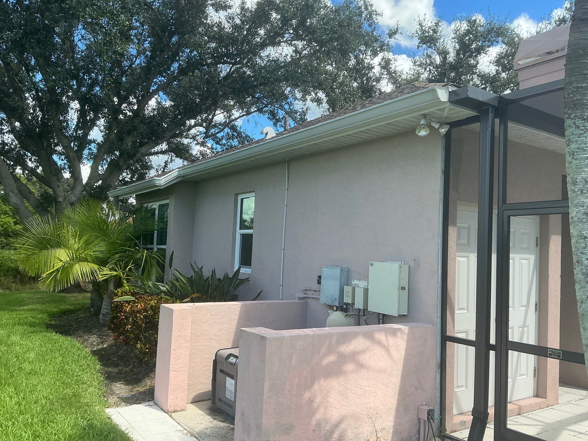 White 6-Inch Seamless Gutters in Sarasota FL by Gutter Professor by Gutter Professors