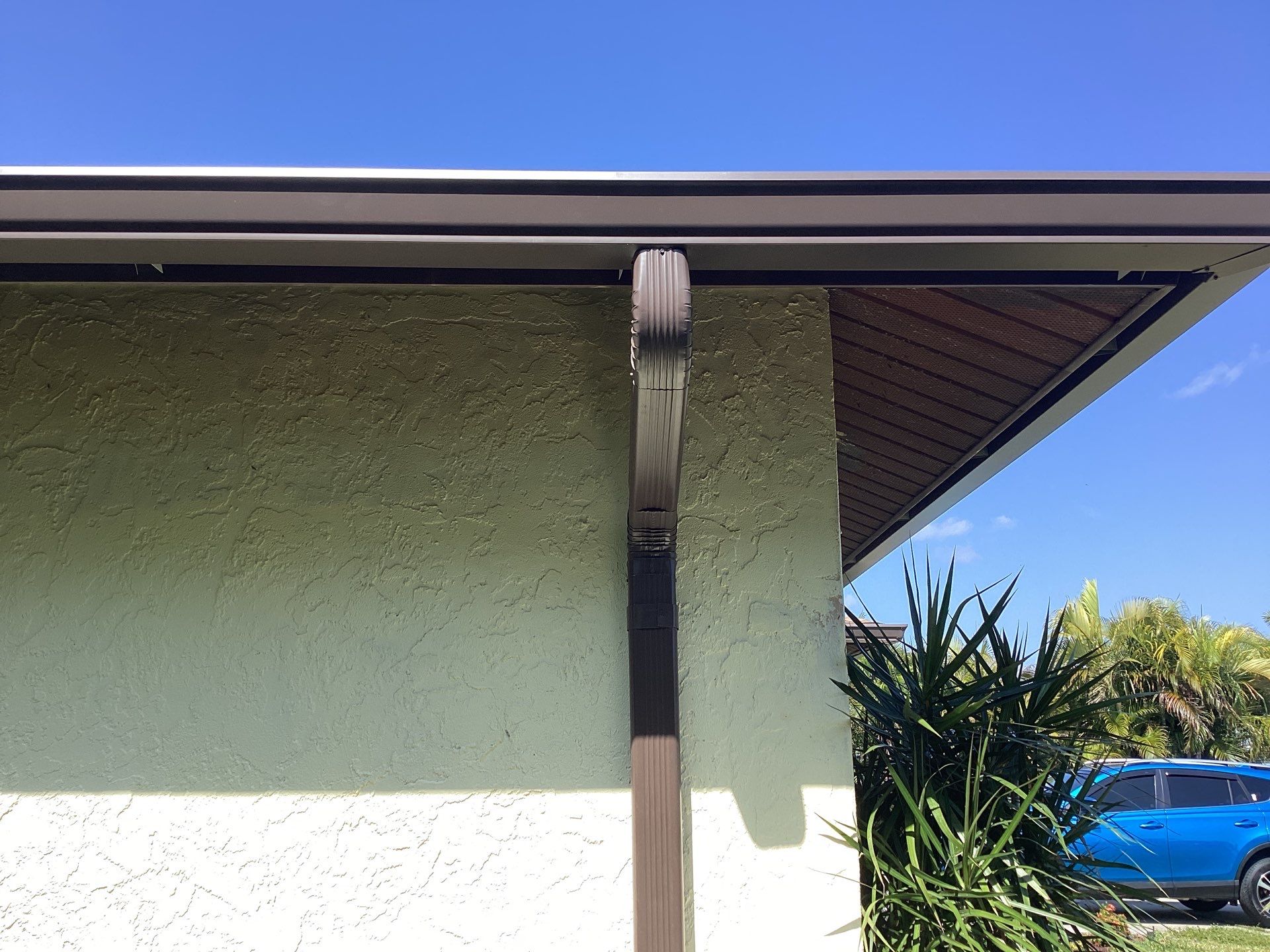 Musket Brown Seamless Gutters using 6 Inch Seamless Gutters in Cape Coral FL by Gutter Professors