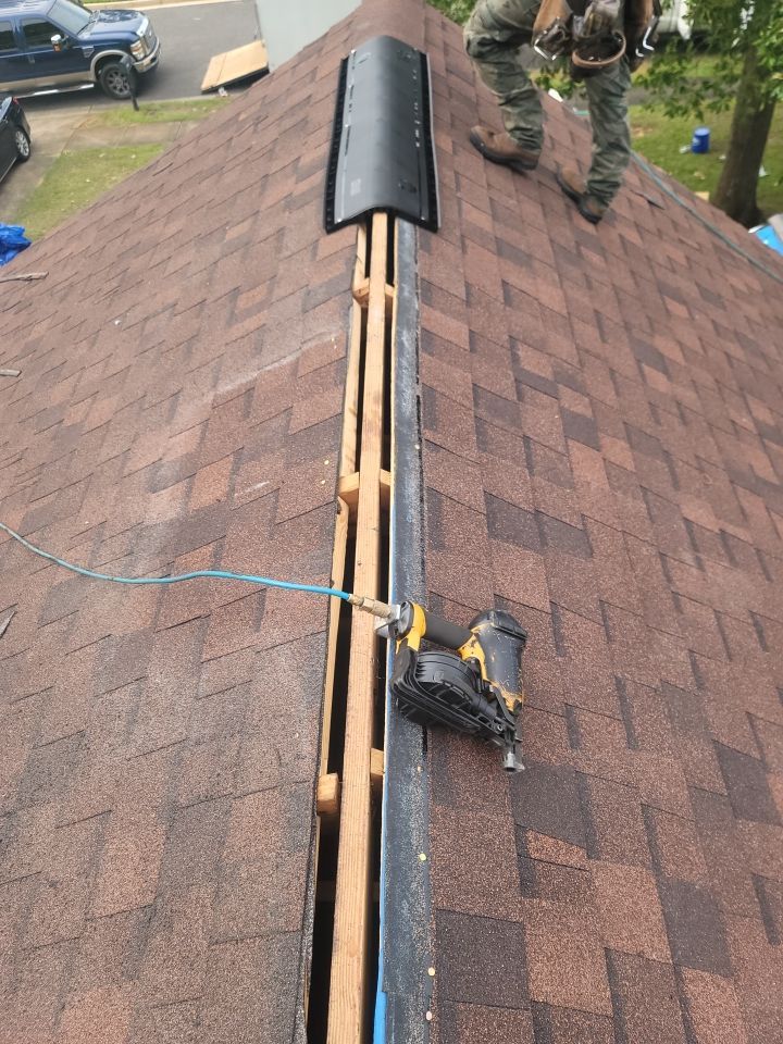 Residential Roofing Installation using Roof Replacement by American Roofing & Construction LLC