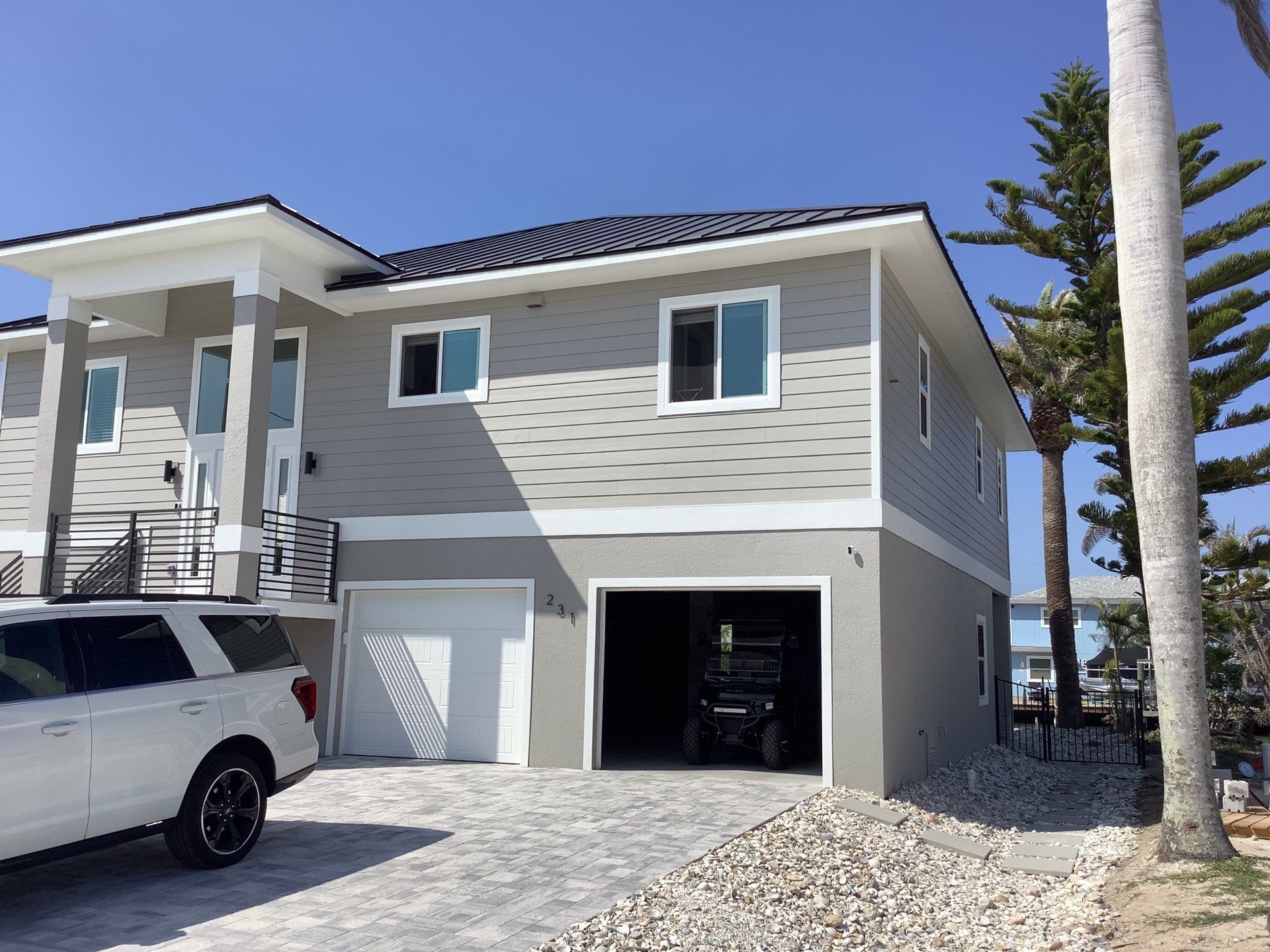 Custom Black Seamless Gutter in Fort Myers Beach FL by Gutter Professors