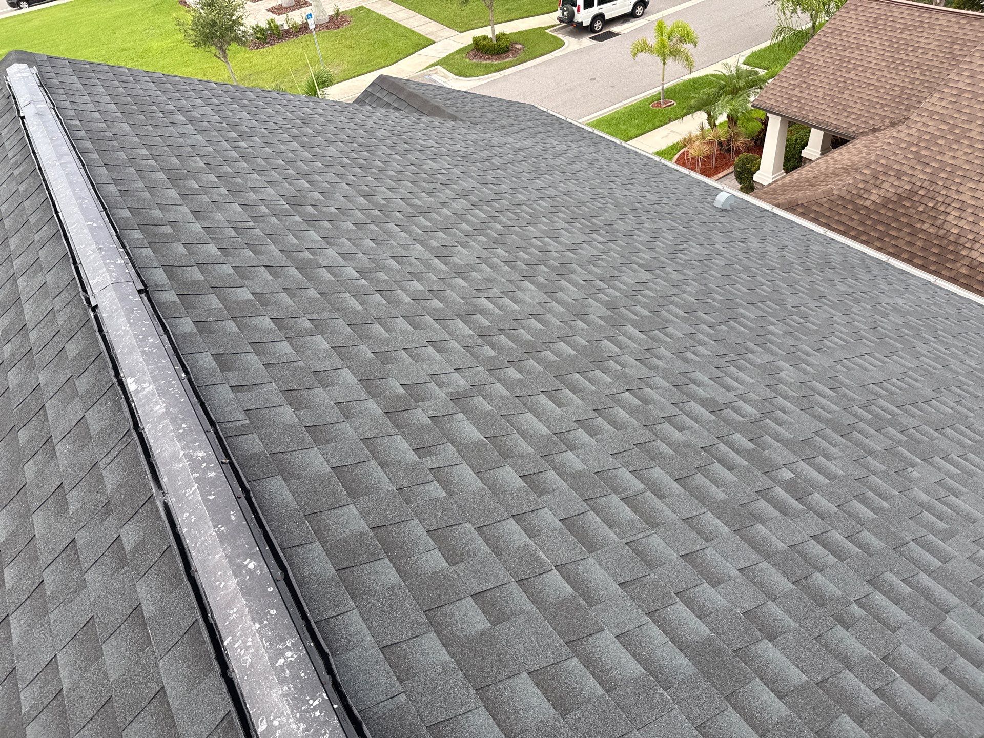 2-Story Asphalt Shingle Roof Cleaning & House Wash – Cypress Mill, Sun City Center, FL by Sunshine AquaWash