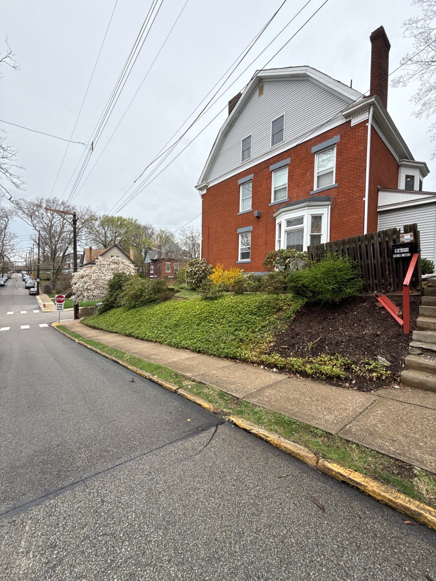 Stamped Concrete and Retaining Wall by Cousins Roofing Siding & Decks