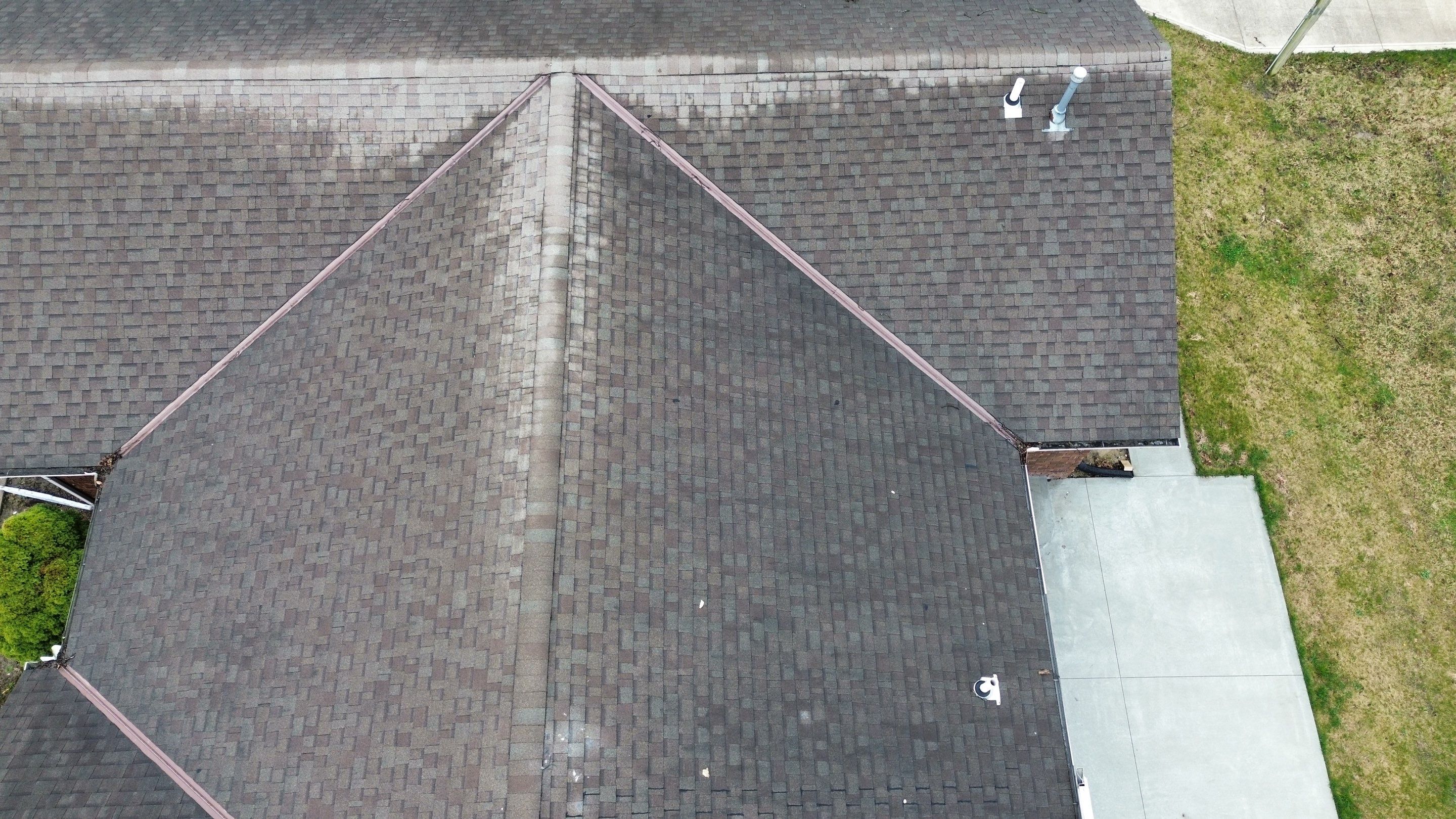 Residential Roofing Installation using Performance Panel Metal - Crinkle Bronze by RoofX 