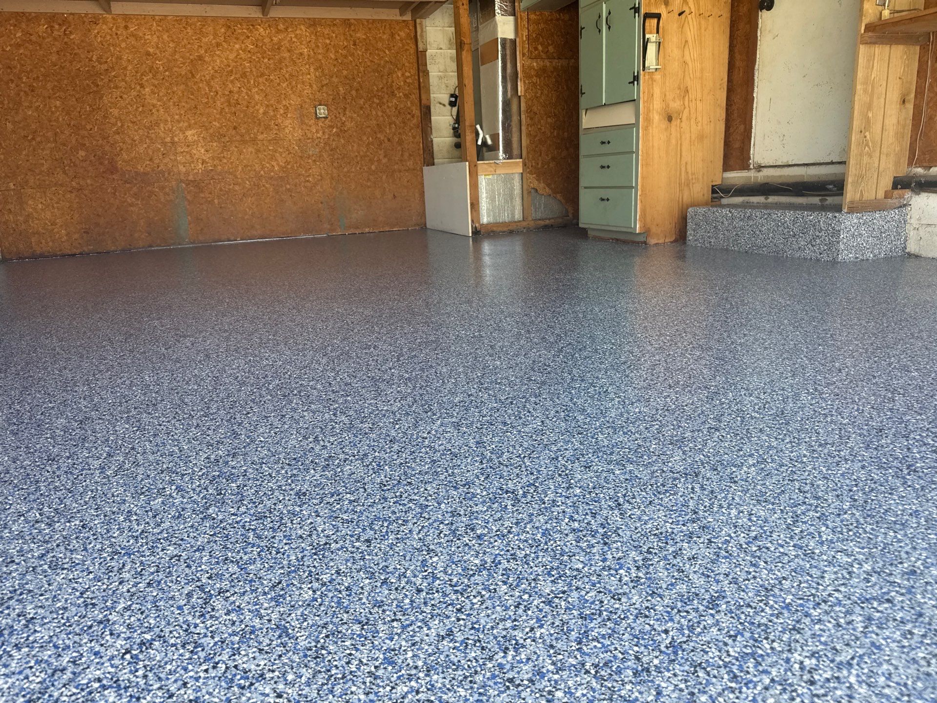 Garage in Midnight by Innovative Concrete Coatings 