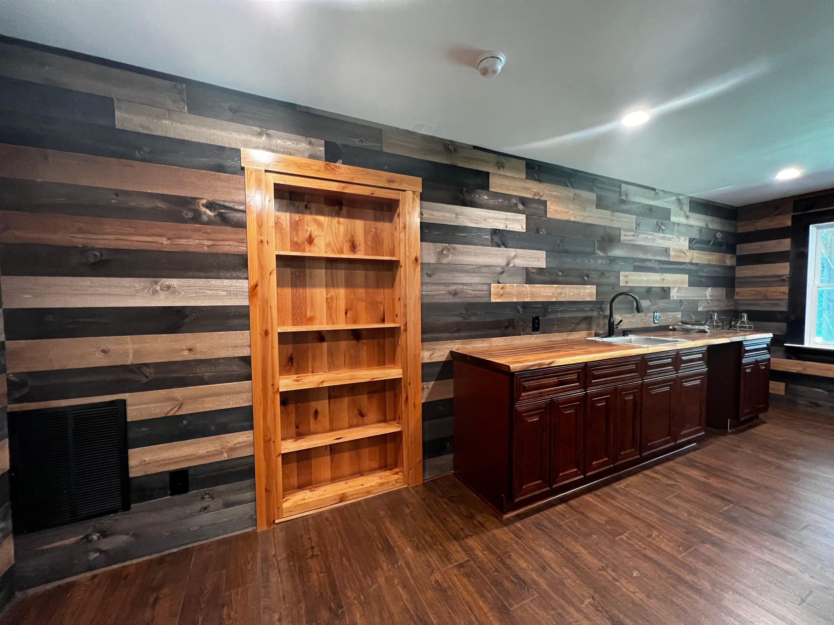 Custom Basement Remodeling With Home Theater and Bar in Woodstock by Swift Home Renovations