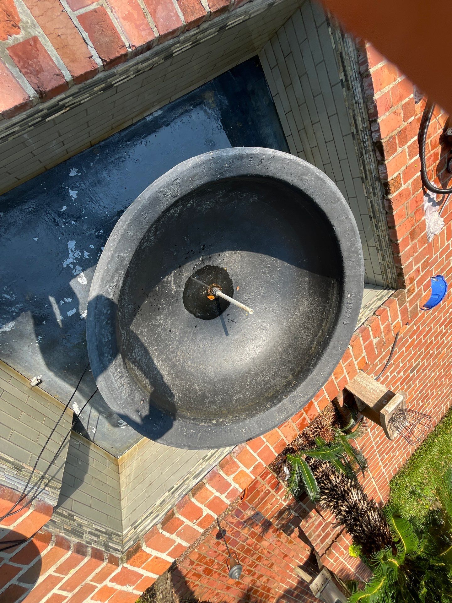 Pool Cleaning using Pool Cleaner by College Bros Outdoor services