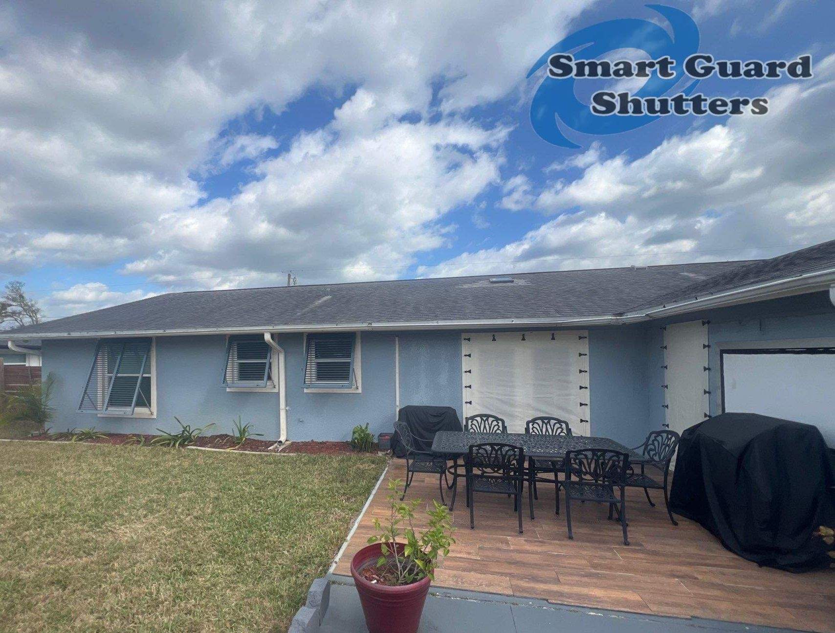 Hurricane Protection in Blue Grey by Smart Guard Shutters