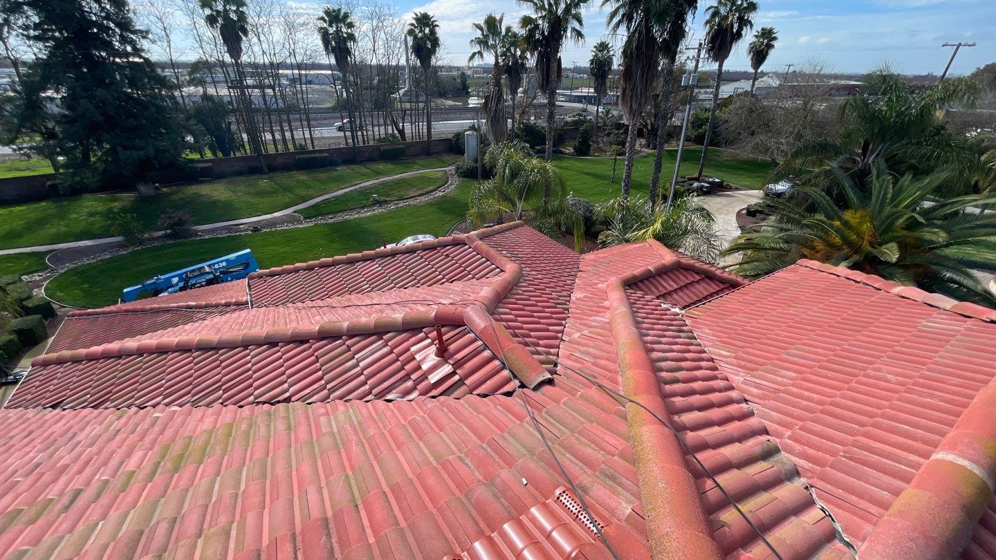 Tile refurbish project using existing tiles and replaced underlayment and battens by Straight Edge Roofing Inc