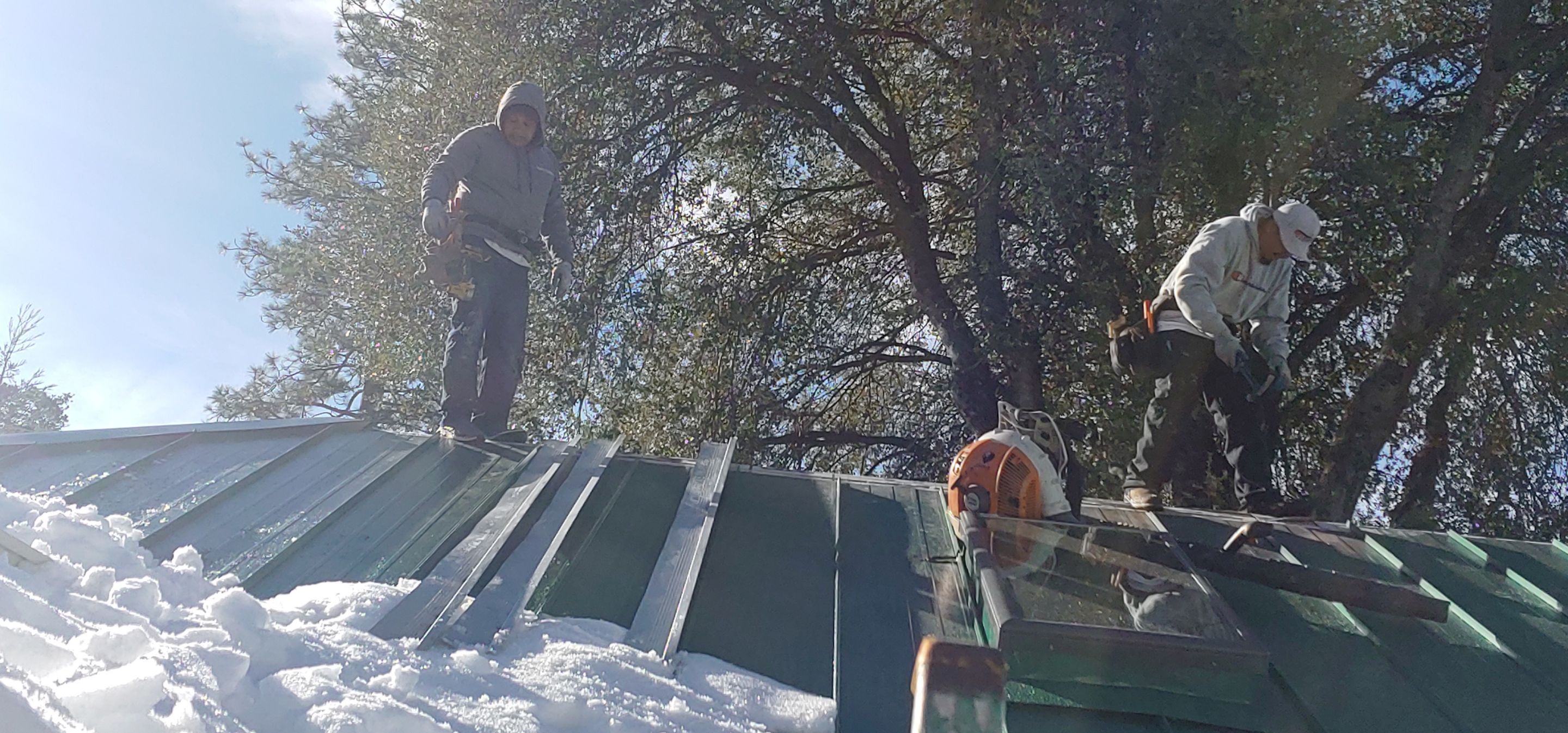 Metal roofing installation using Standing seam metal roofing system by Straight Edge Roofing Inc