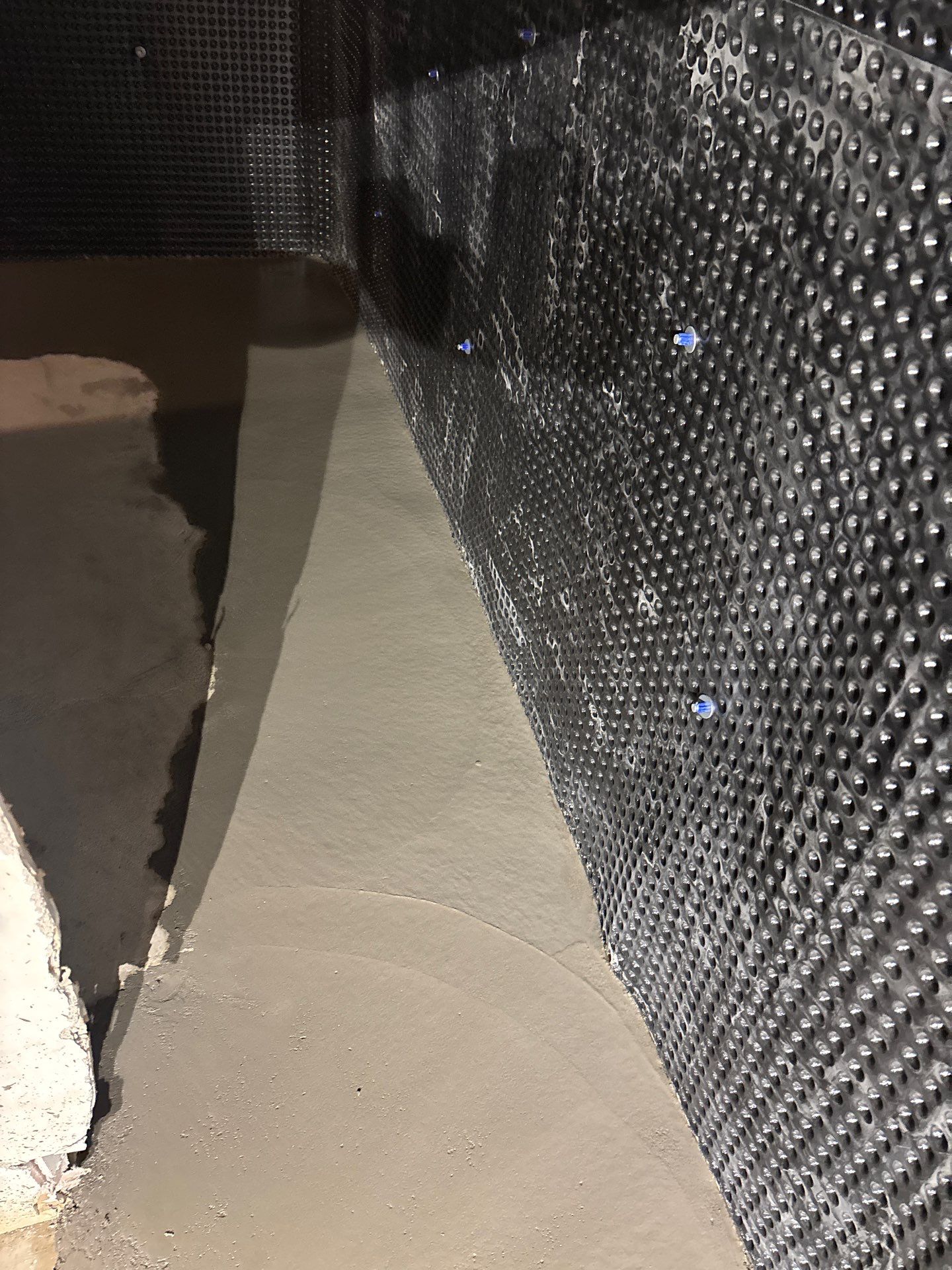 Interior Drain Tile & Buried Discharge in South Minneapolis by Waterproofing Northeast