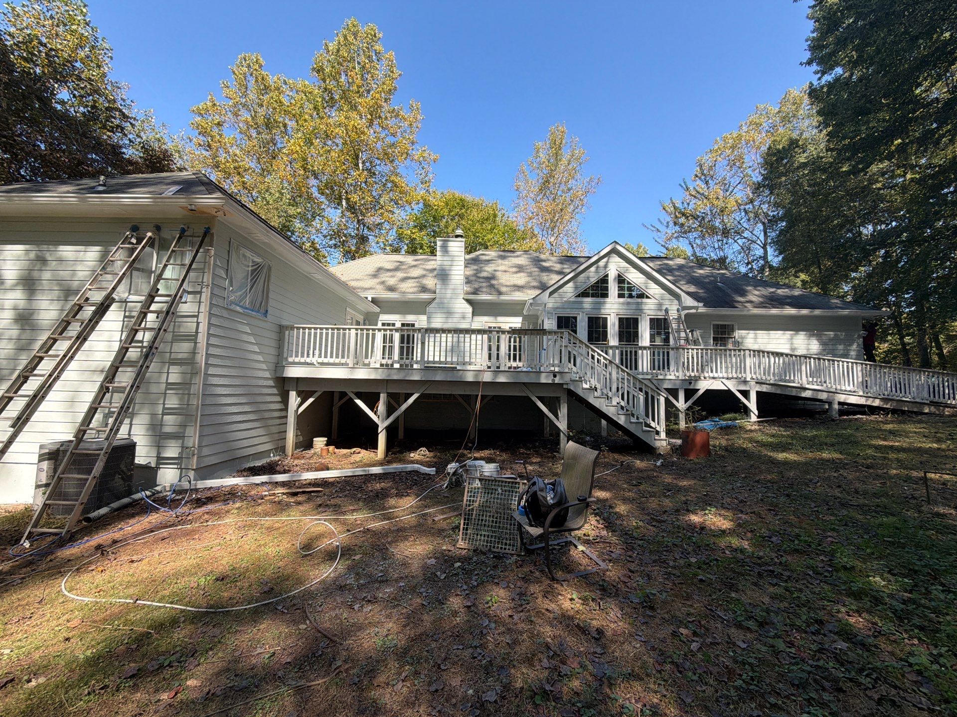 Exterior Residential Painting and Deck Refinishing in Canton, Georgia by Swift Home Renovations 
