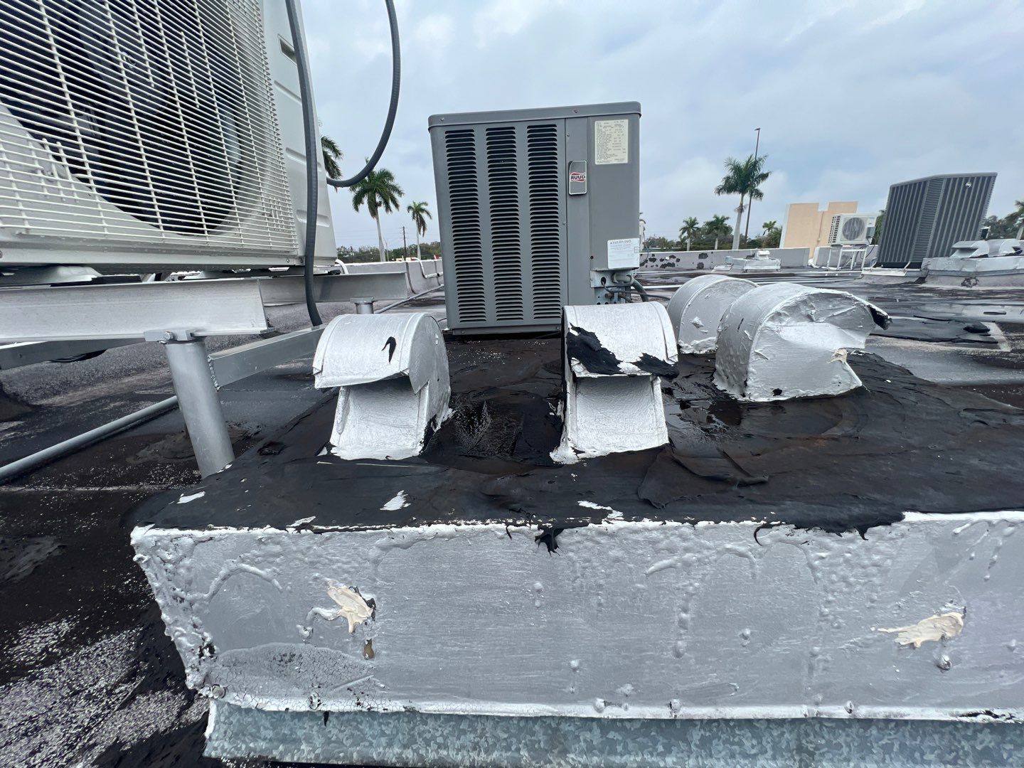 Commercial Roofing Repair using Roof Sealant by Four Peaks Roofing