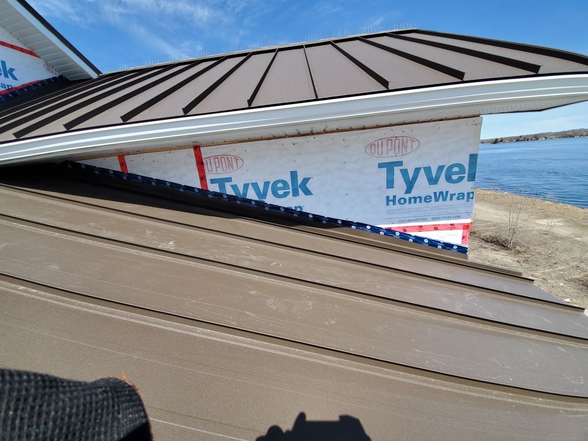 New Home Construction using 16" Standing Seam Panels by Jay Carter Roofing & Sheet Metal