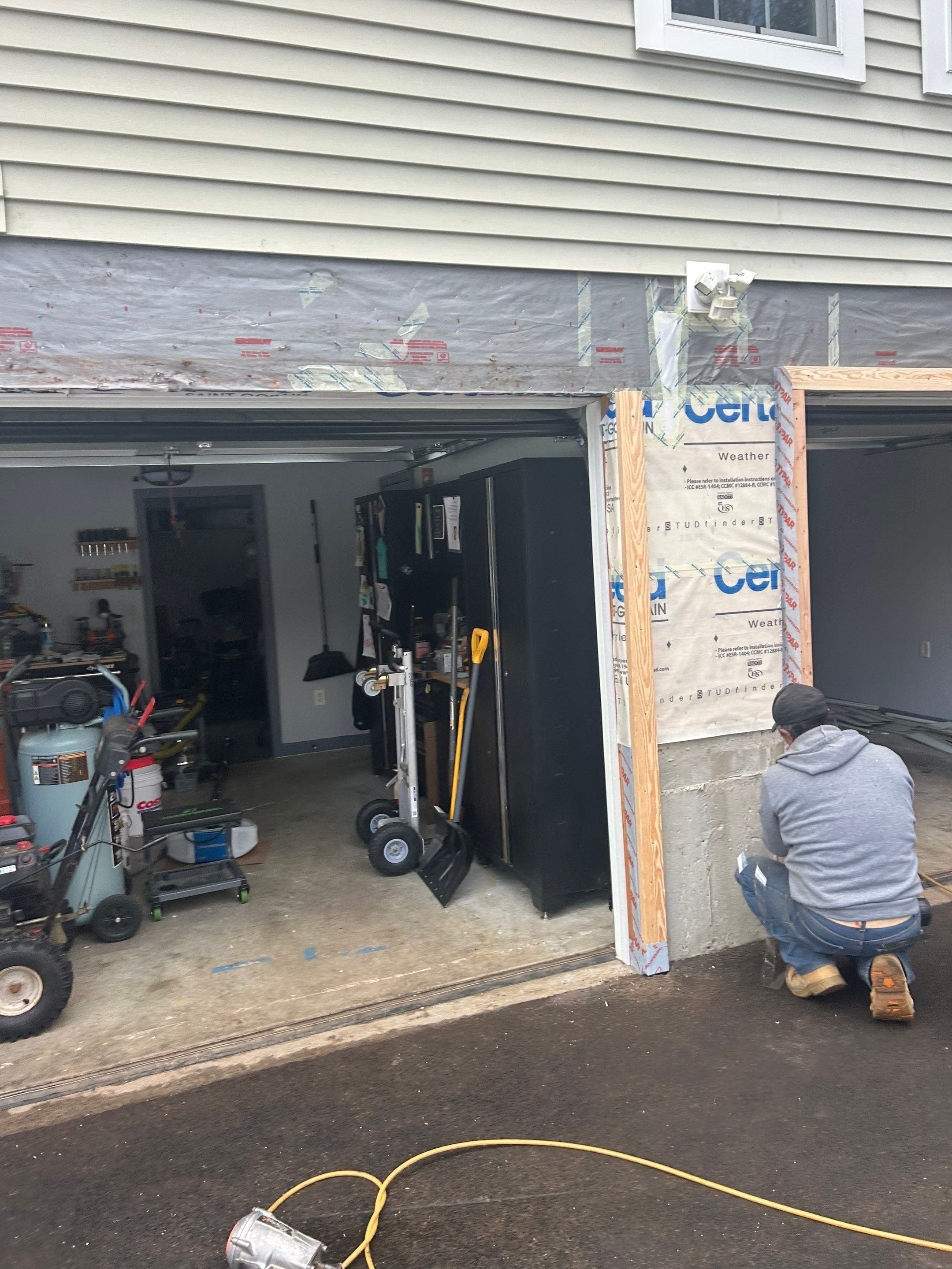 Garage Door Upgrade with Added Light & Detail by DiGiorgi Roofing and Siding Inc