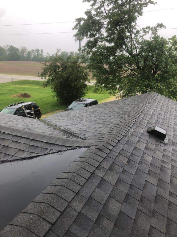 Residential Roofing Installation using 60 mil rubber roof  by Nitro Roofing and Construction