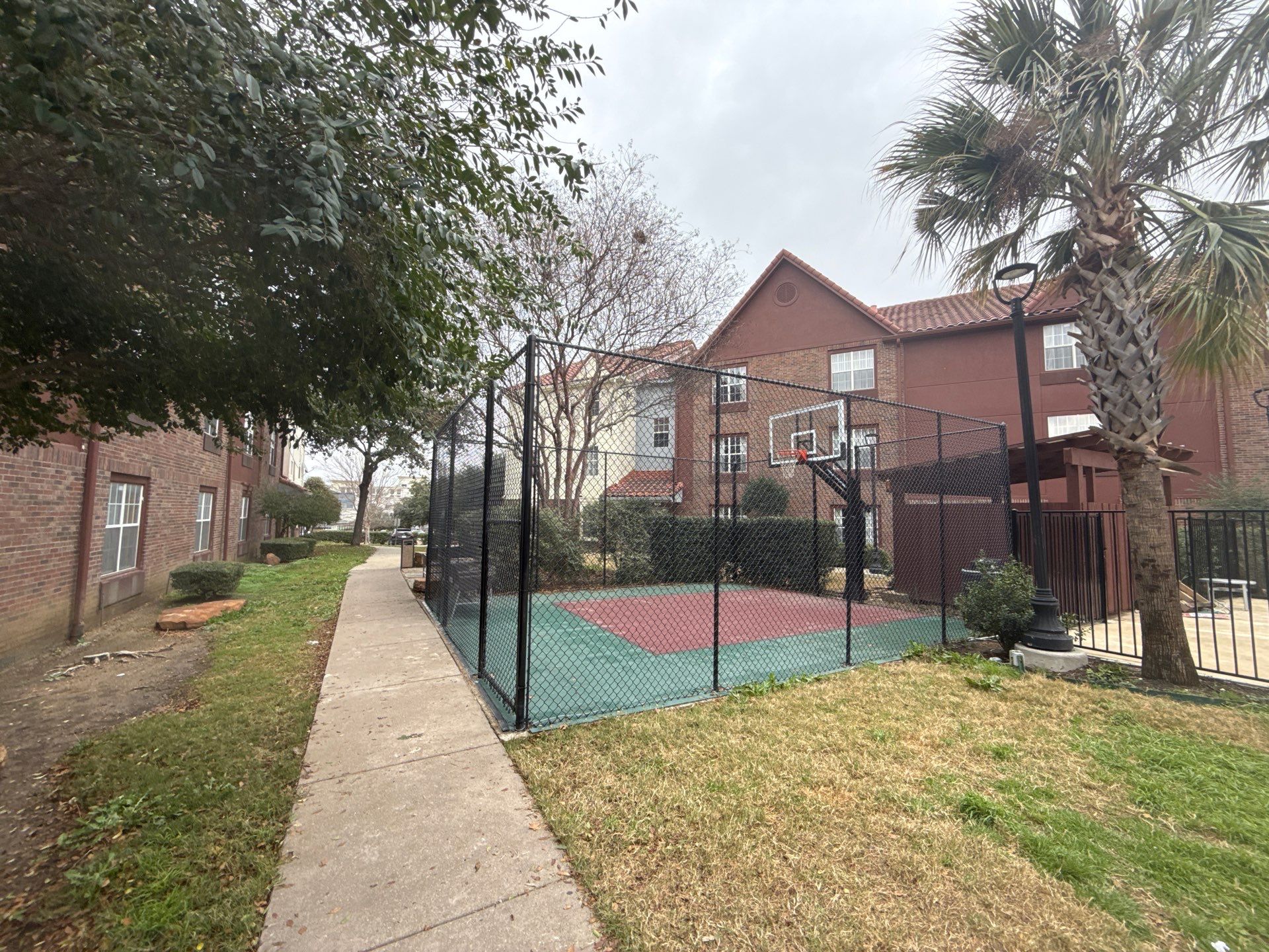 5' Wrought iron fencing w/ 10' vinyl chainlink by Grizzly Fence And Patio