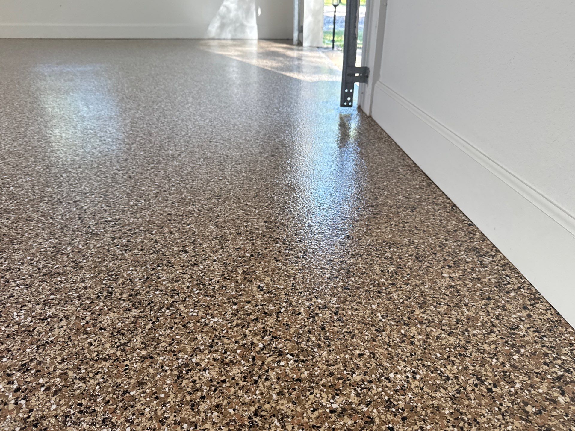 Garage in Hawthorne, FL in Sandstone by Cross Creek Concrete Coatings