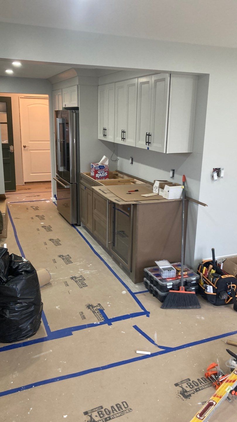 Interior Renovations, Kitchen Remodel, and Window Replacement by Ivy Lea Construction