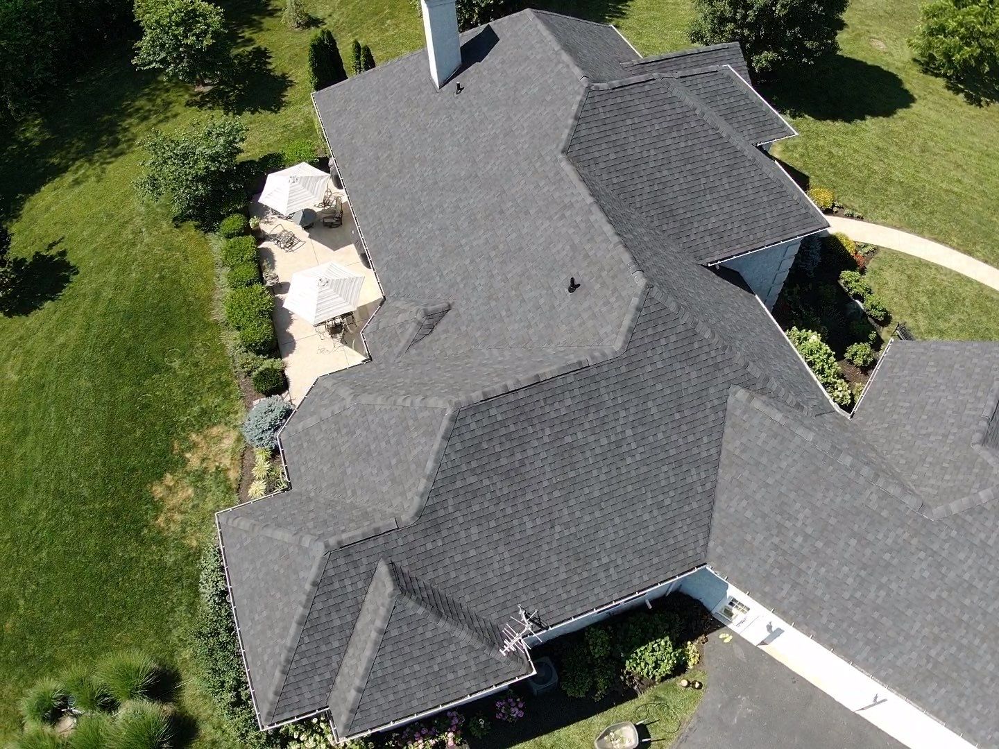 Residential Roofing Installation using Atlas Pinnacle Black Shingles by 614 Exteriors